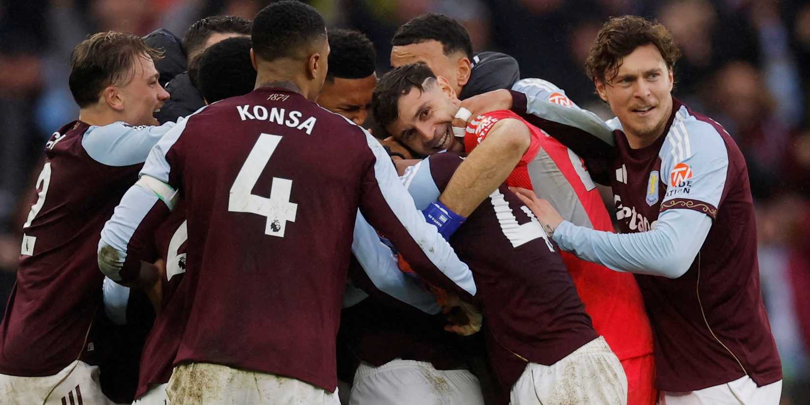 Aston Villa players celebrate after the match