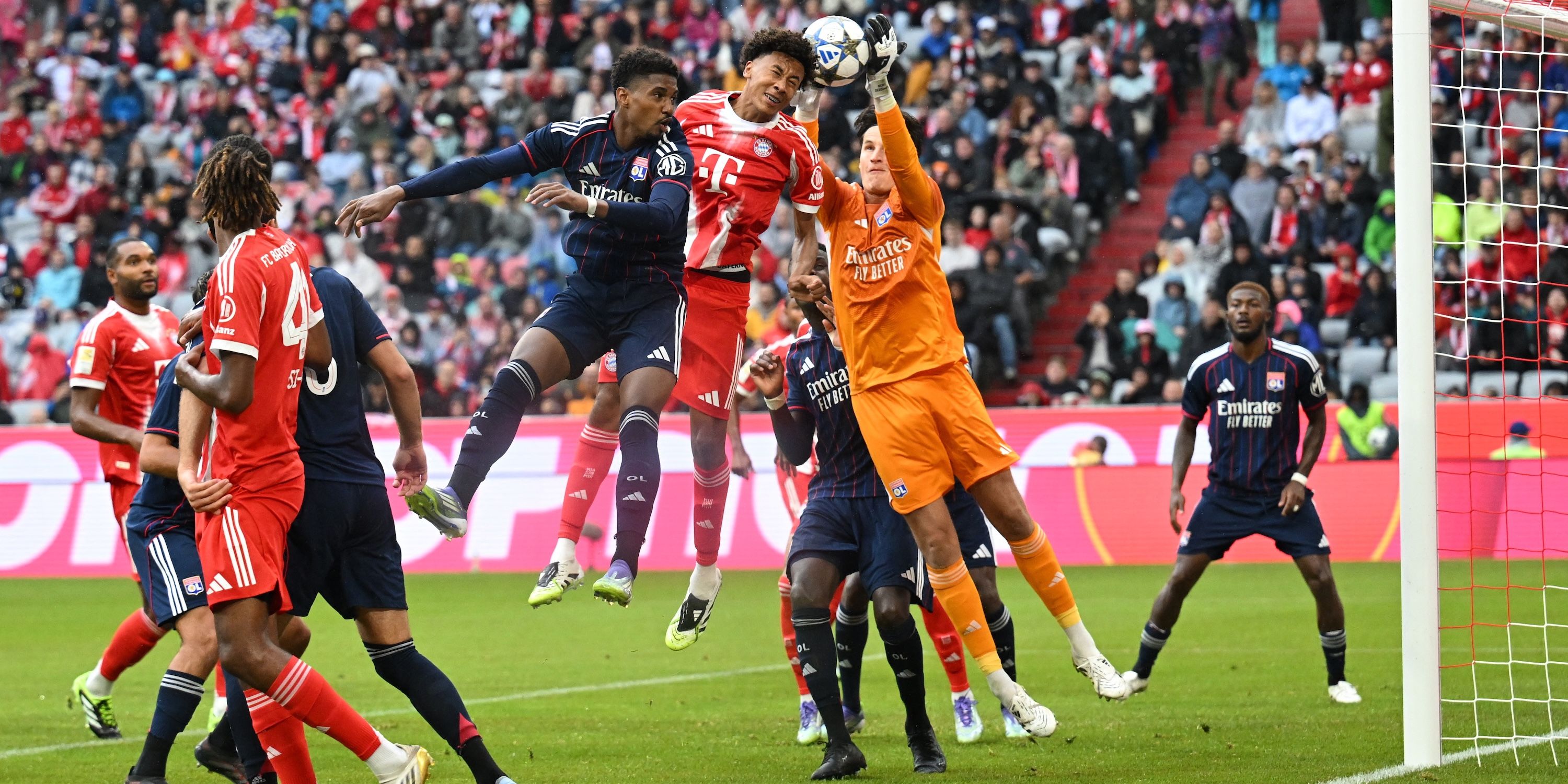 Bayern Munich's Cassiano Kiala in action with Olympique Lyonnais' Remy Descamps
