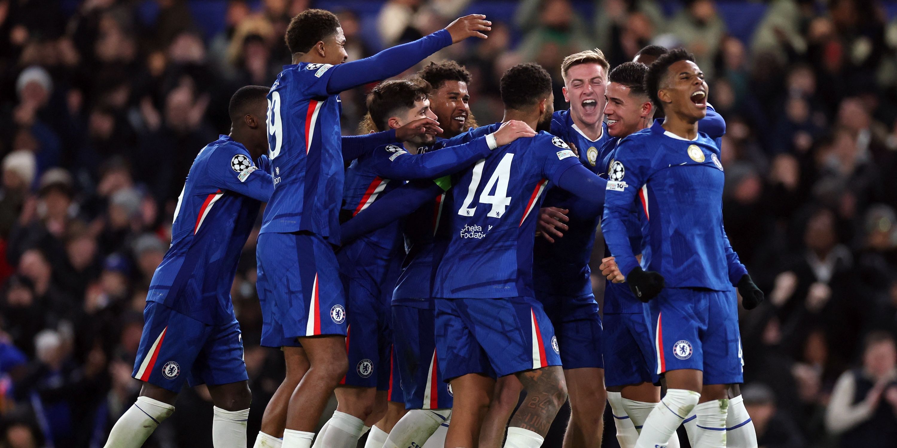 Chelsea's Liam Delap celebrates scoring their third goal with teammates
