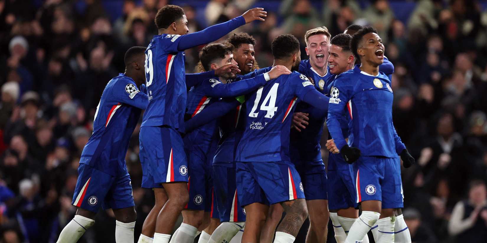 Chelsea's Liam Delap celebrates scoring their third goal with teammates