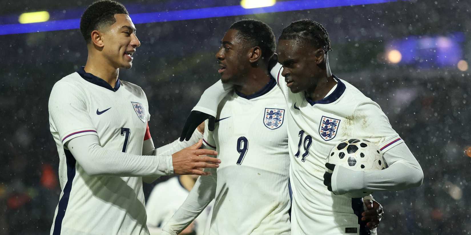 England's Divin Mubama celebrates scoring their first goal with England's Jobe Bellingham and England's Tyrique George