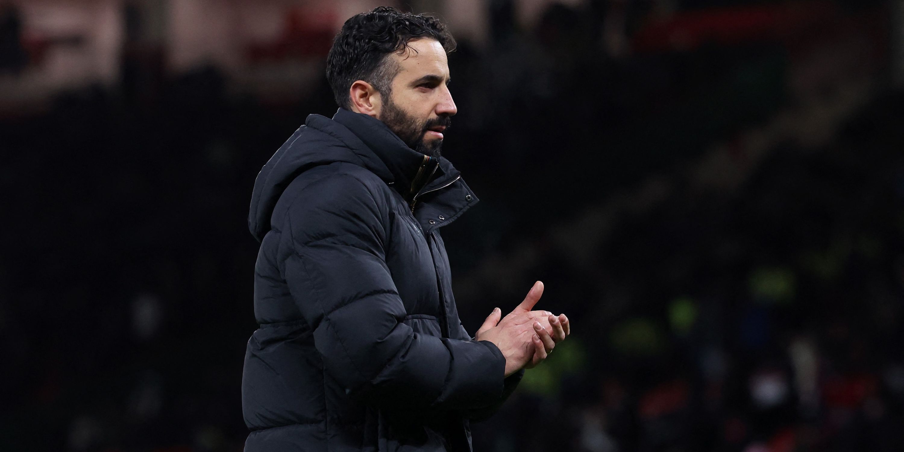Manchester United manager Ruben Amorim applauds fans after the match