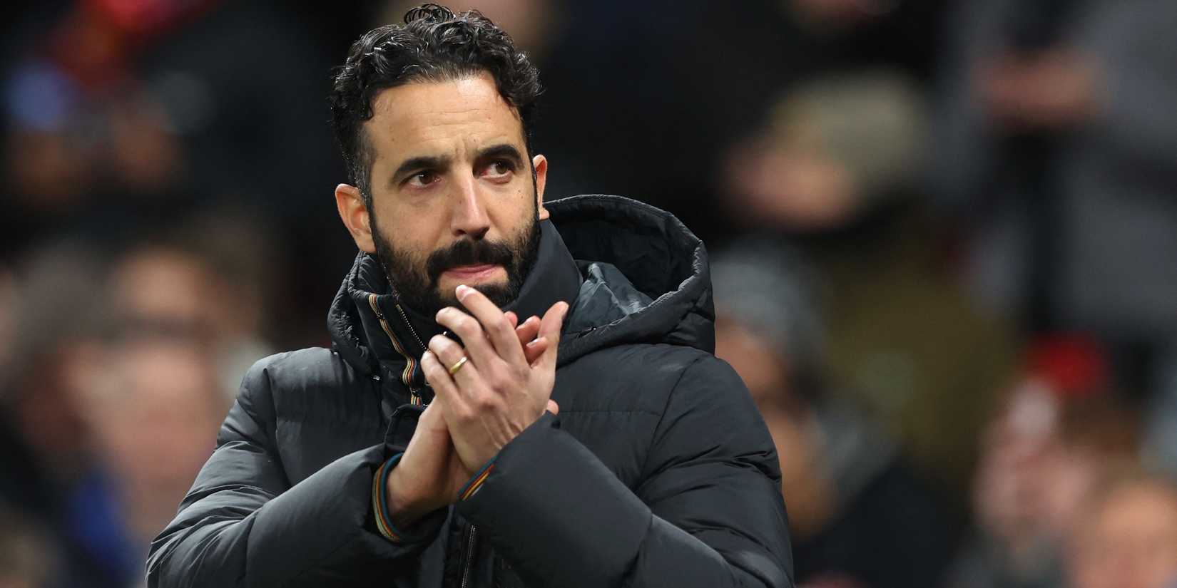 Manchester United manager Ruben Amorim applauds fans before the match