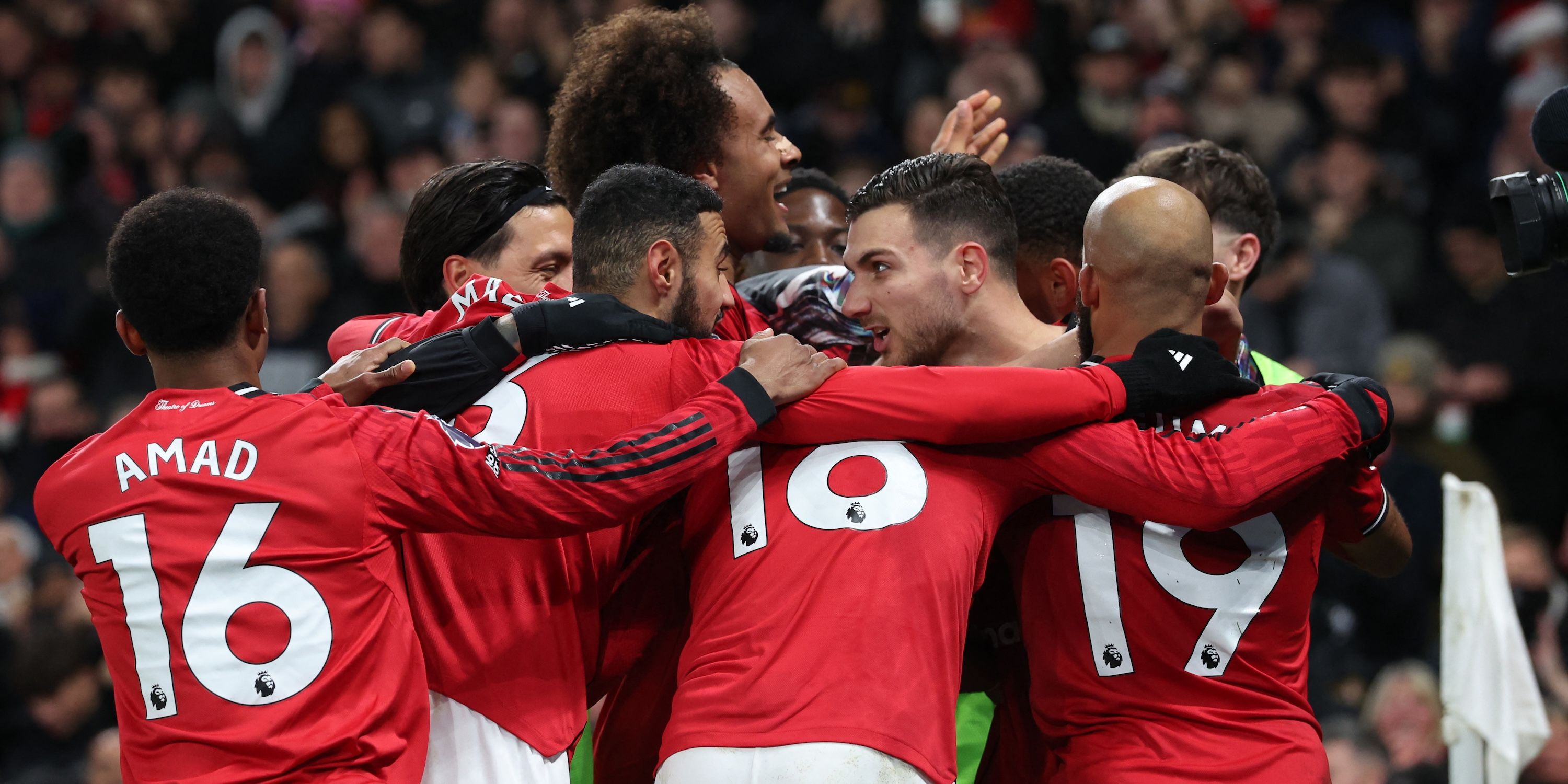 Manchester United's Diogo Dalot celebrates scoring their first goal with teammates