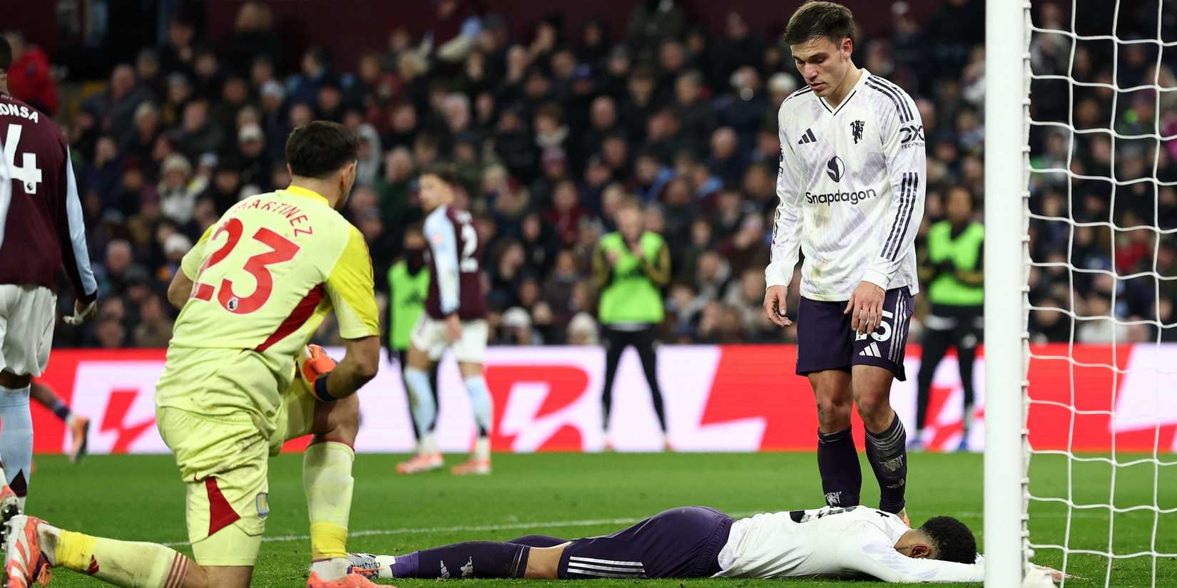 Manchester United's Matheus Cunha reacts after missing a chance to score as Manuel Ugarte looks on