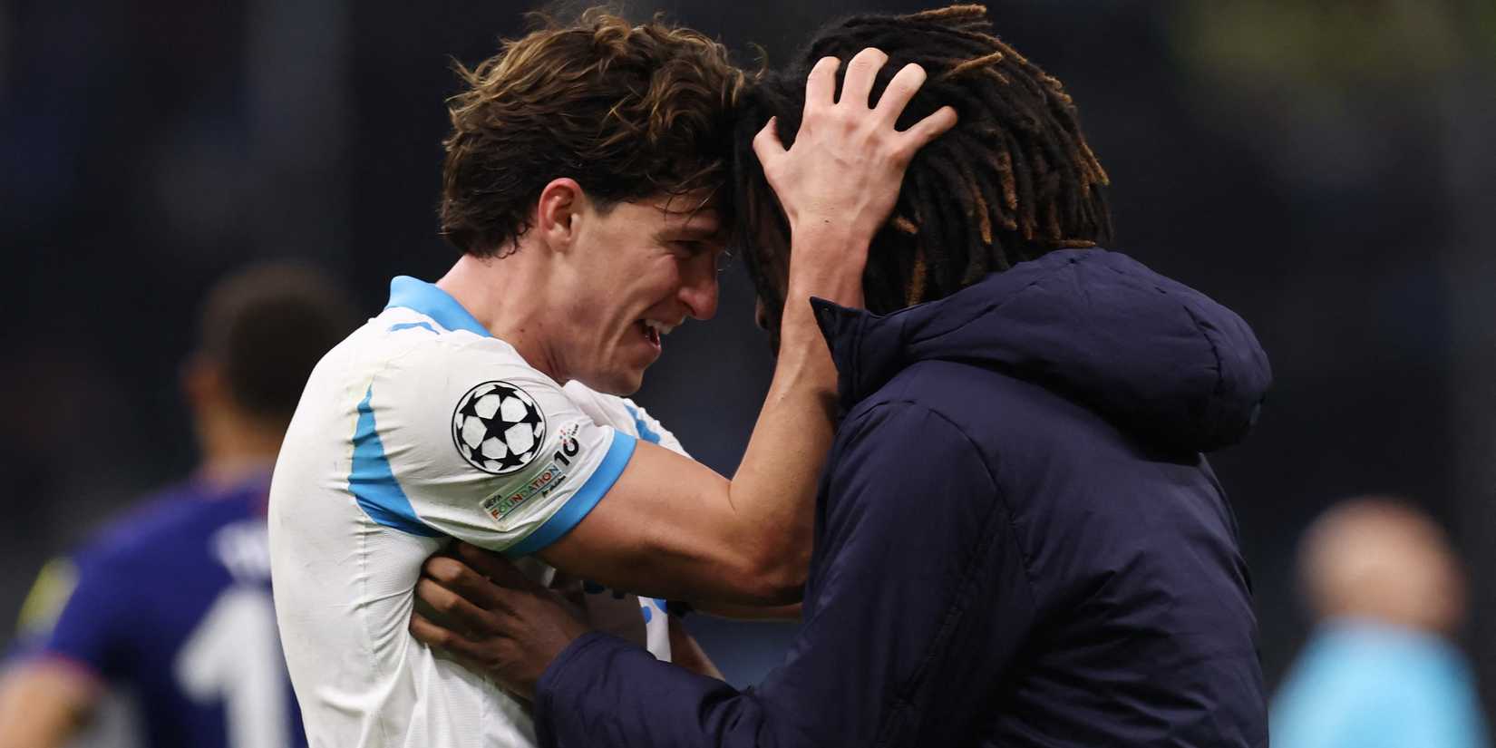 Olympique de Marseille's Leonardo Balerdi celebrates after the match with Darryl Bakola