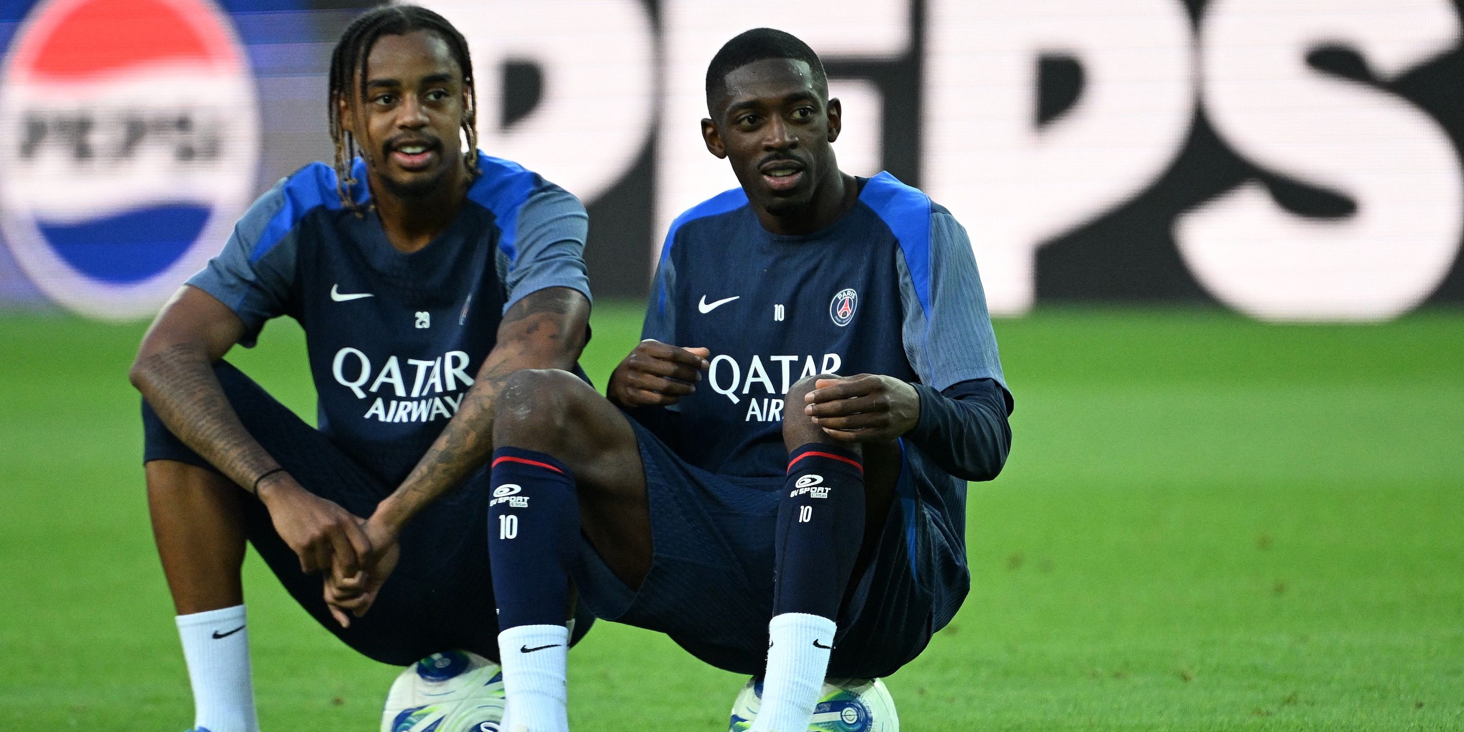 Paris St Germain's Ousmane Dembele with Bradley Barcola during training