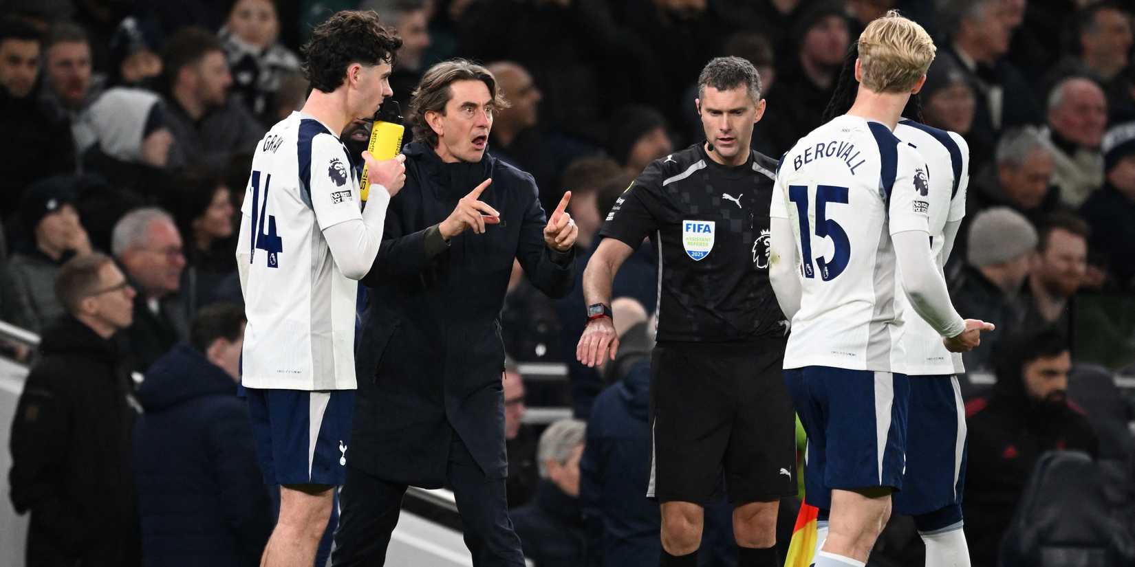 Tottenham Hotspur manager Thomas Frank gives instructions to Tottenham Hotspur's Archie Gray and Tottenham Hotspur's Lucas Bergvall