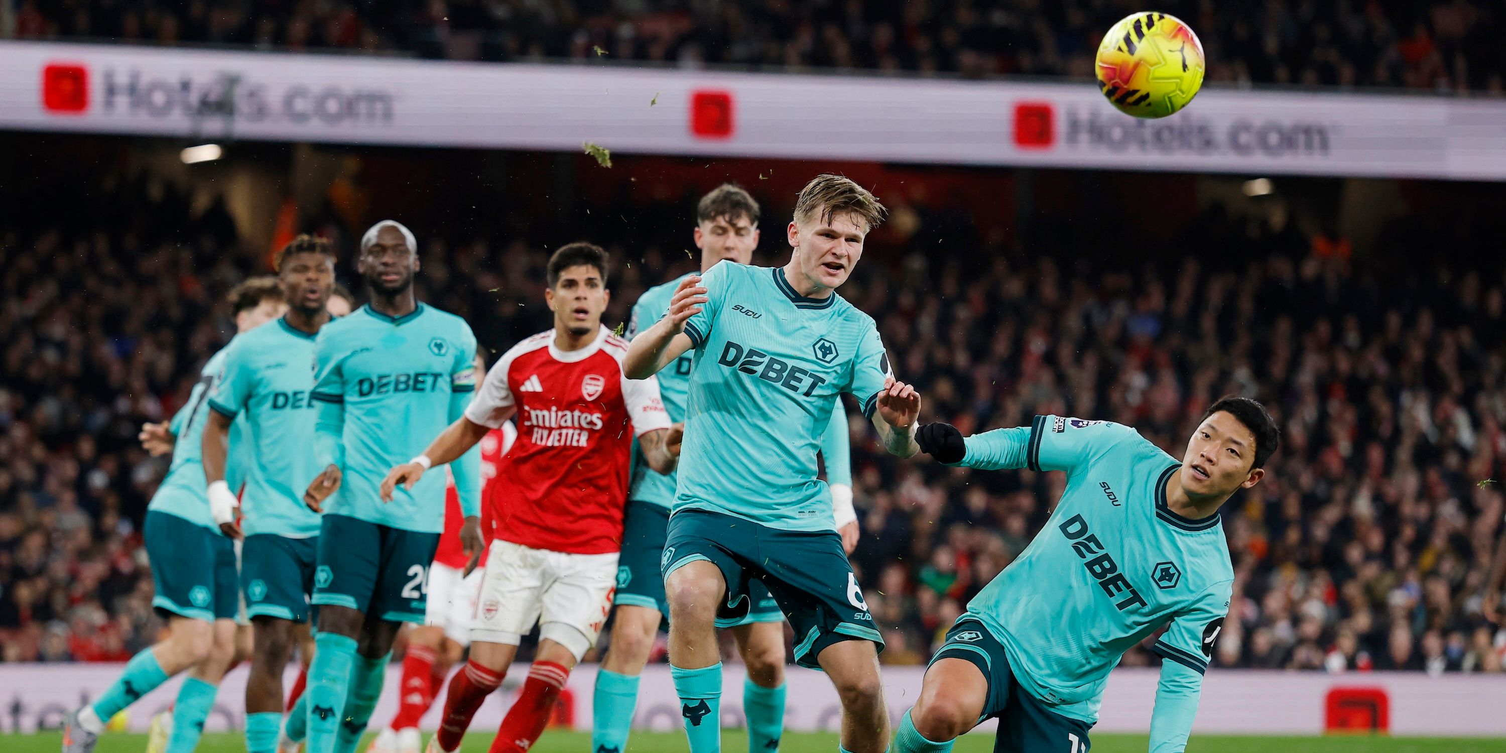 David Moller Wolfe and Hwang Hee-chan of Wolverhampton Wanderers in action 