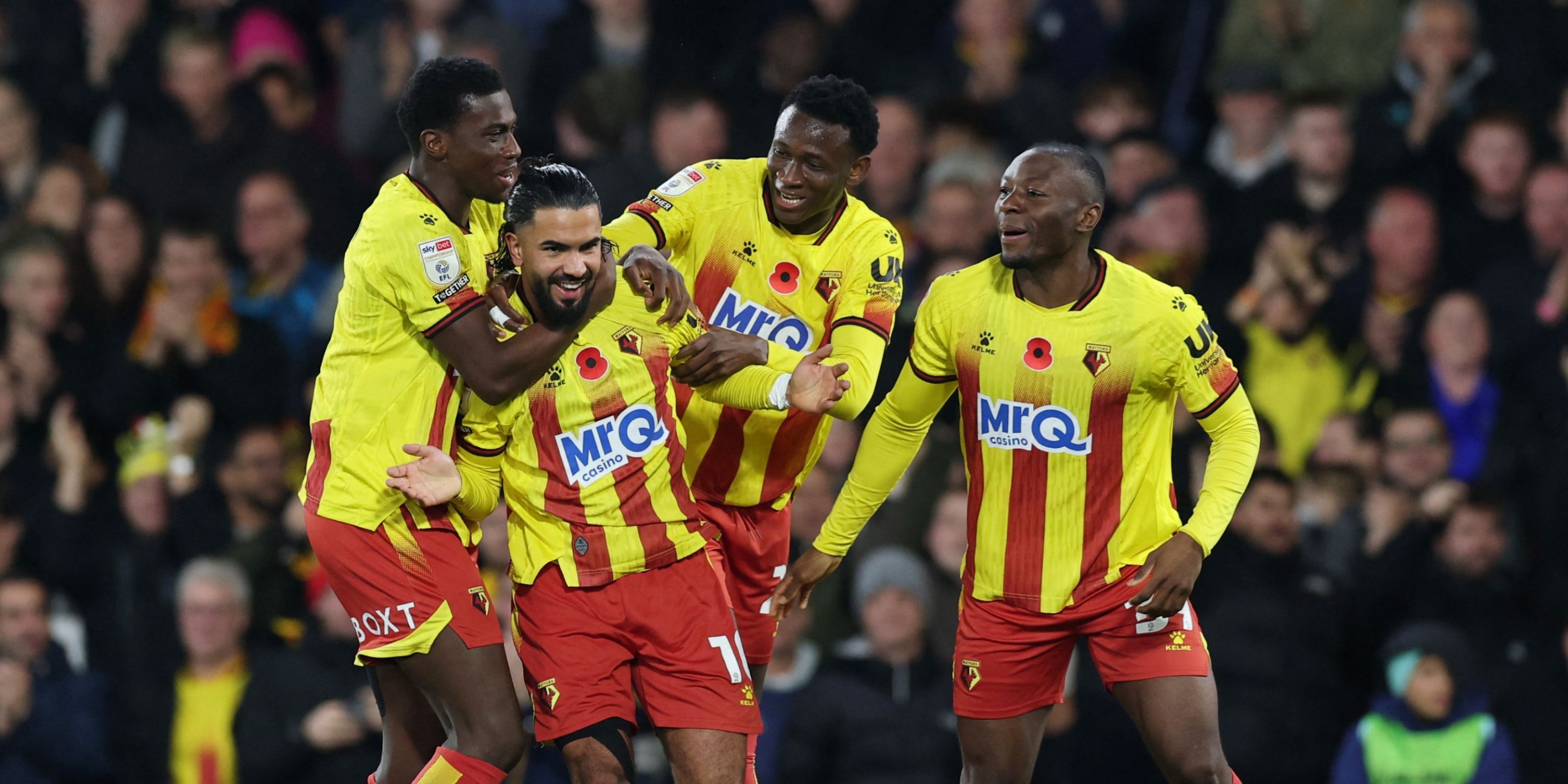 Mamadou Doumbia celebrates with Watford teammates
