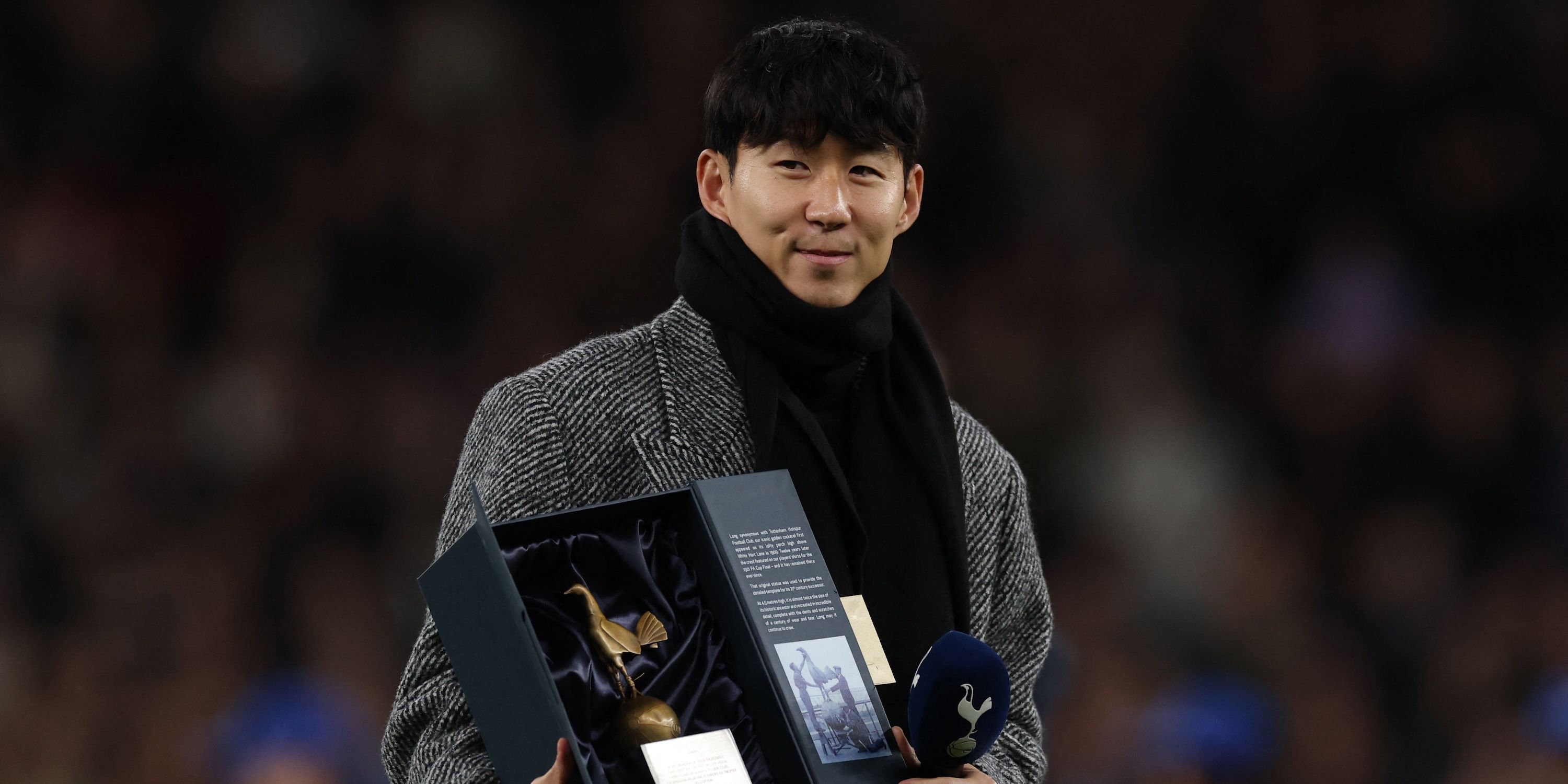 Former Tottenham Hotspur player Son Heung-Min speaks to the crowd before the match 