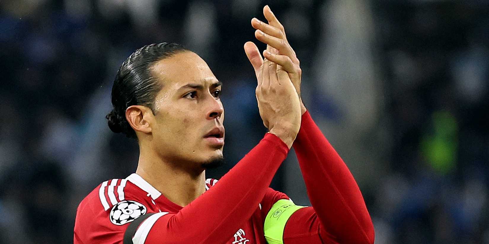 Liverpool's Virgil van Dijk applauds fans after the match