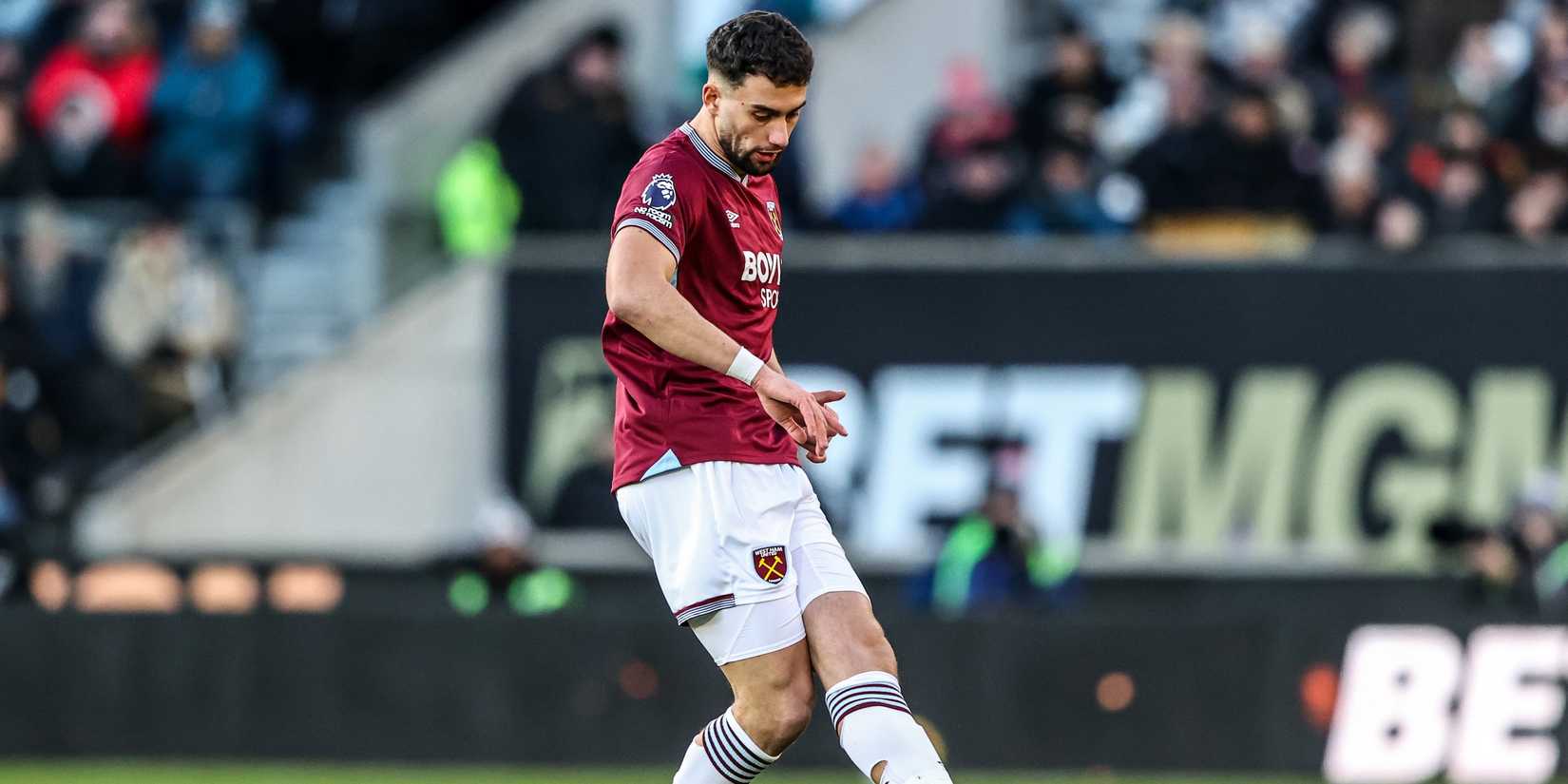 West Ham United's Max Kilman passes the ball during the Premier League match between Wolves and West Ham United