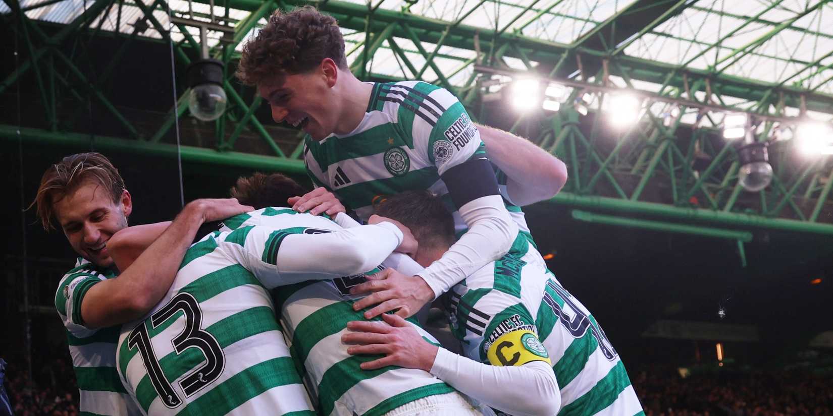 Celtic players celebrate against Rangers