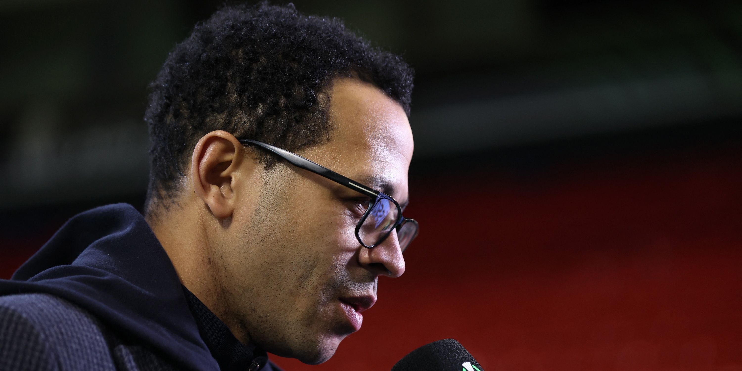 RC Strasbourg coach Liam Rosenior is interviewed before the match 