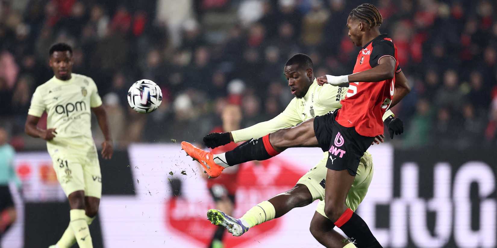 Stade Rennes' Jeremy Jacquet in action with AS Monaco's George Ilenikhena 
