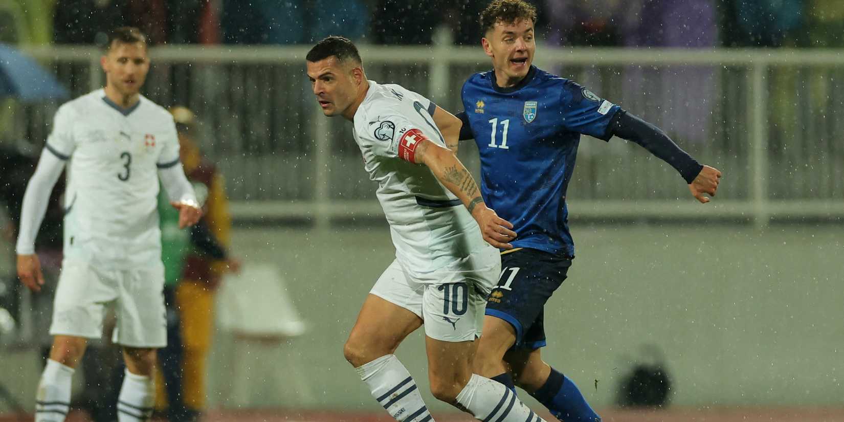 Granit Xhaka of Switzerland and Fisnik Aslani of Kosovo during the match 