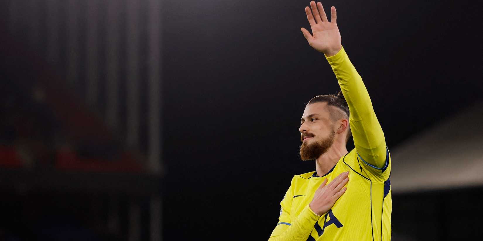 Tottenham Hotspur's Radu Dragusin celebrates after the match-1