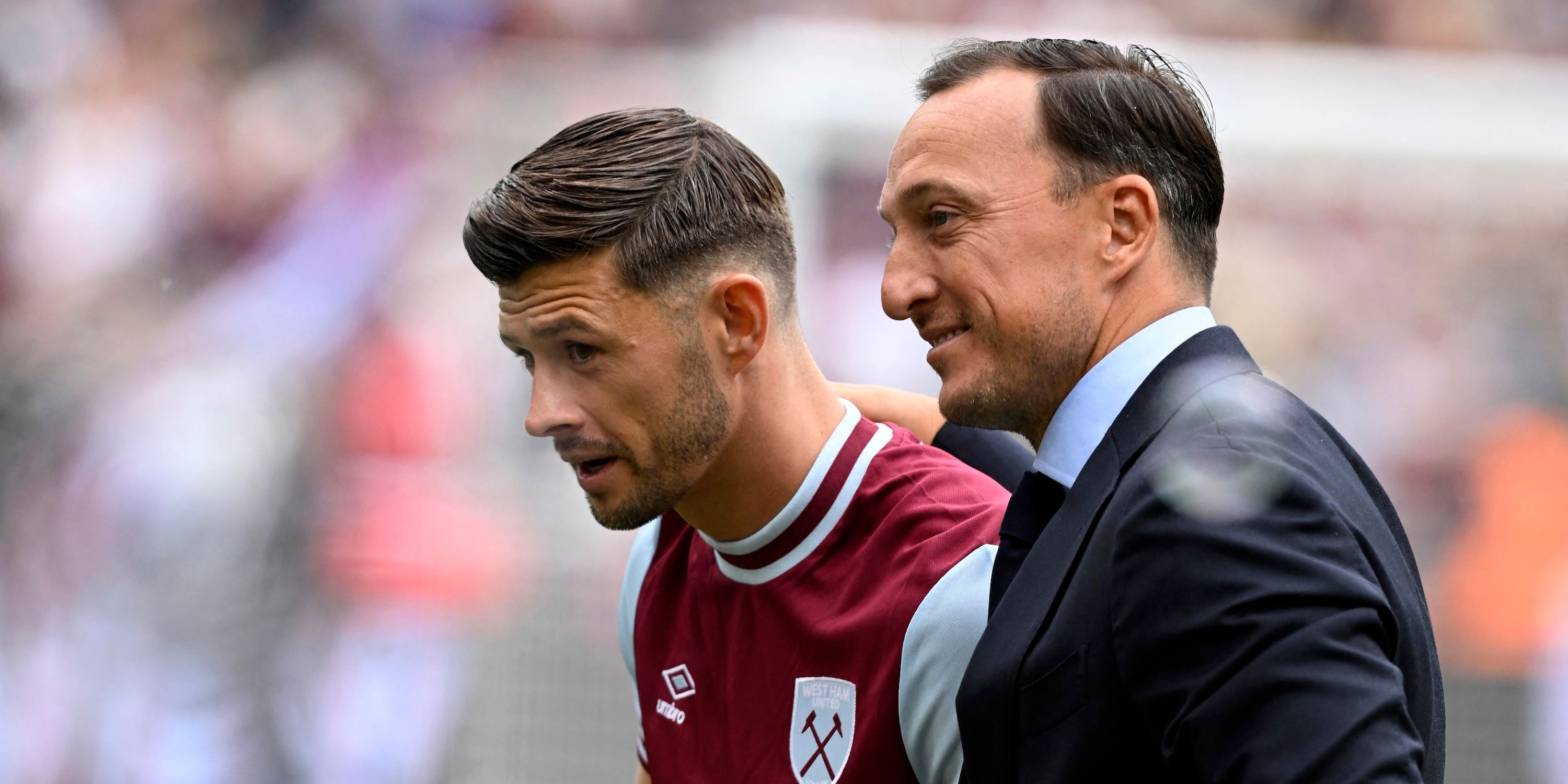 West Ham United's Aaron Cresswell poses with West Ham Sporting Director Mark Noble