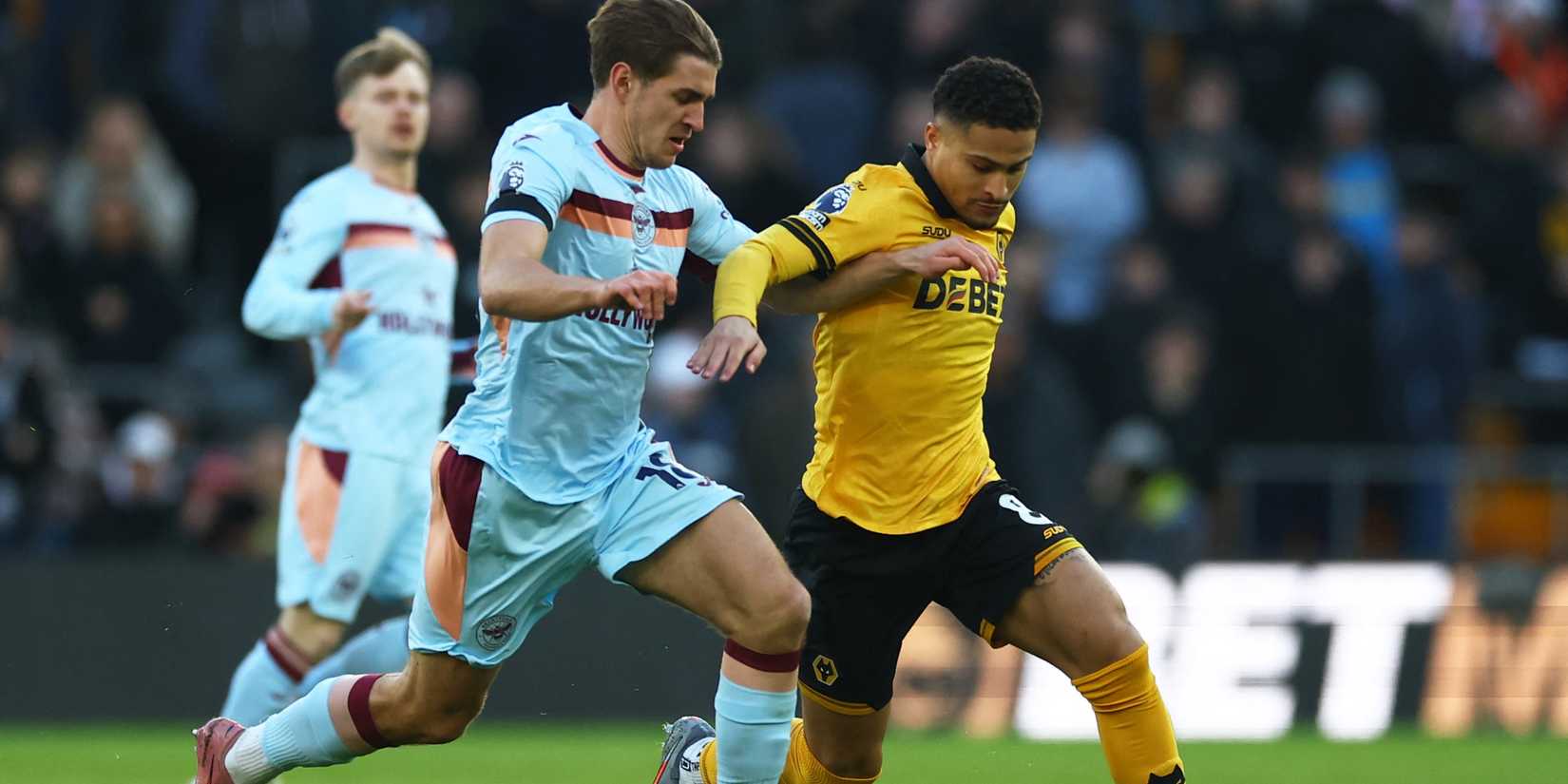 Wolves' Joao Gomez and Brentford's Jehor Yarmolyuk during the match