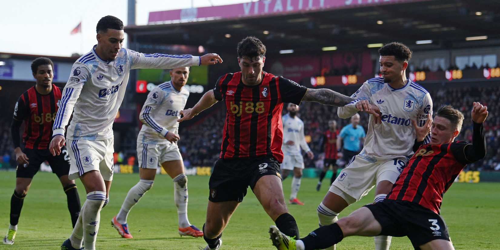  Aston Villa's Morgan Rogers and Jadon Sancho in action with AFC Bournemouth's Marcos Senesi and Adrien Truffert