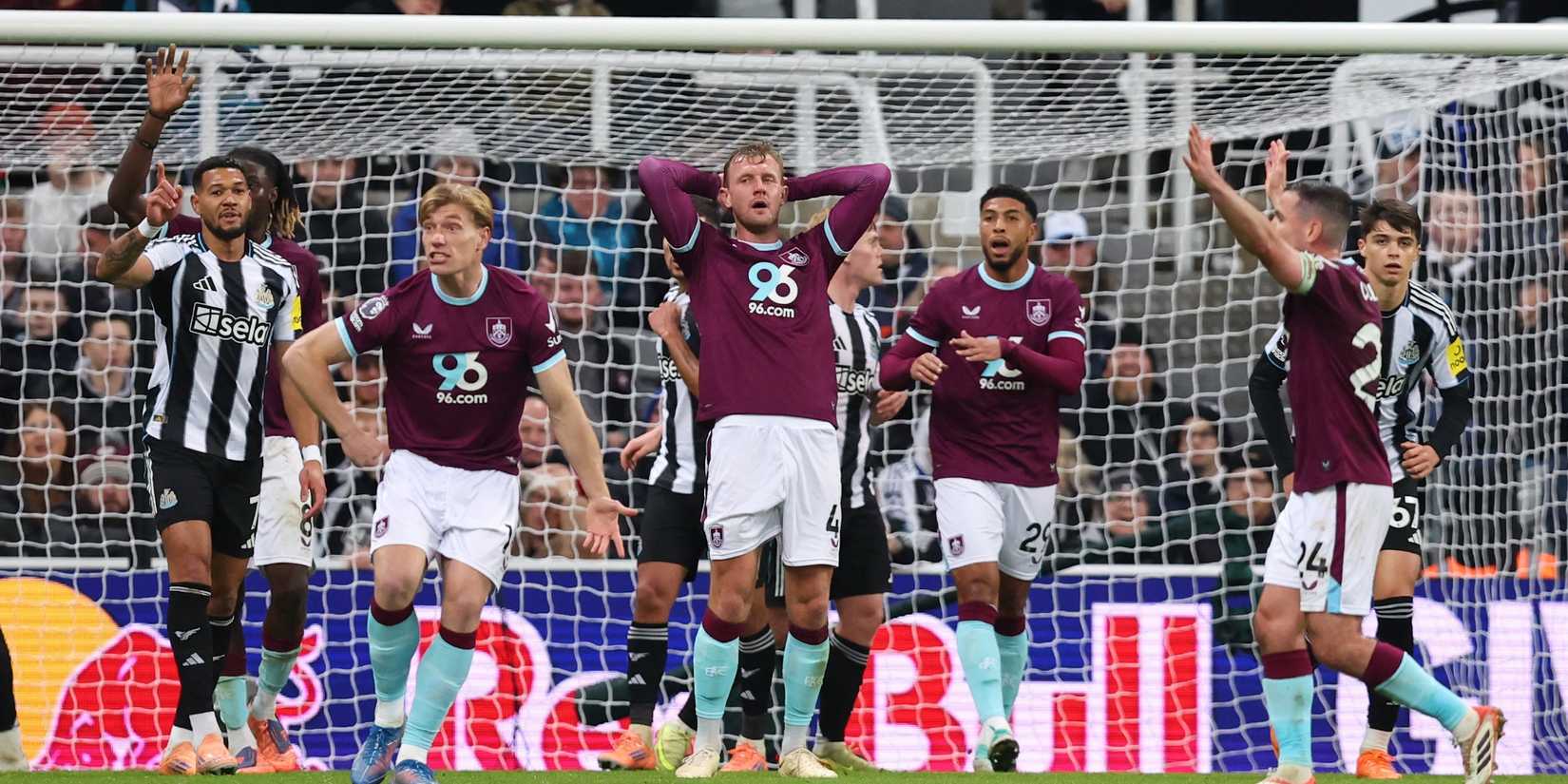 Burnley's Joe Worrall and his teammates react