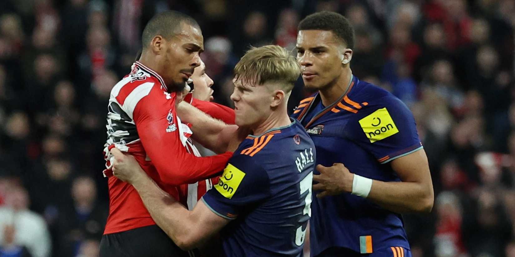 Sunderland's Wilson Isidor clashes with Newcastle United's Lewis Hall