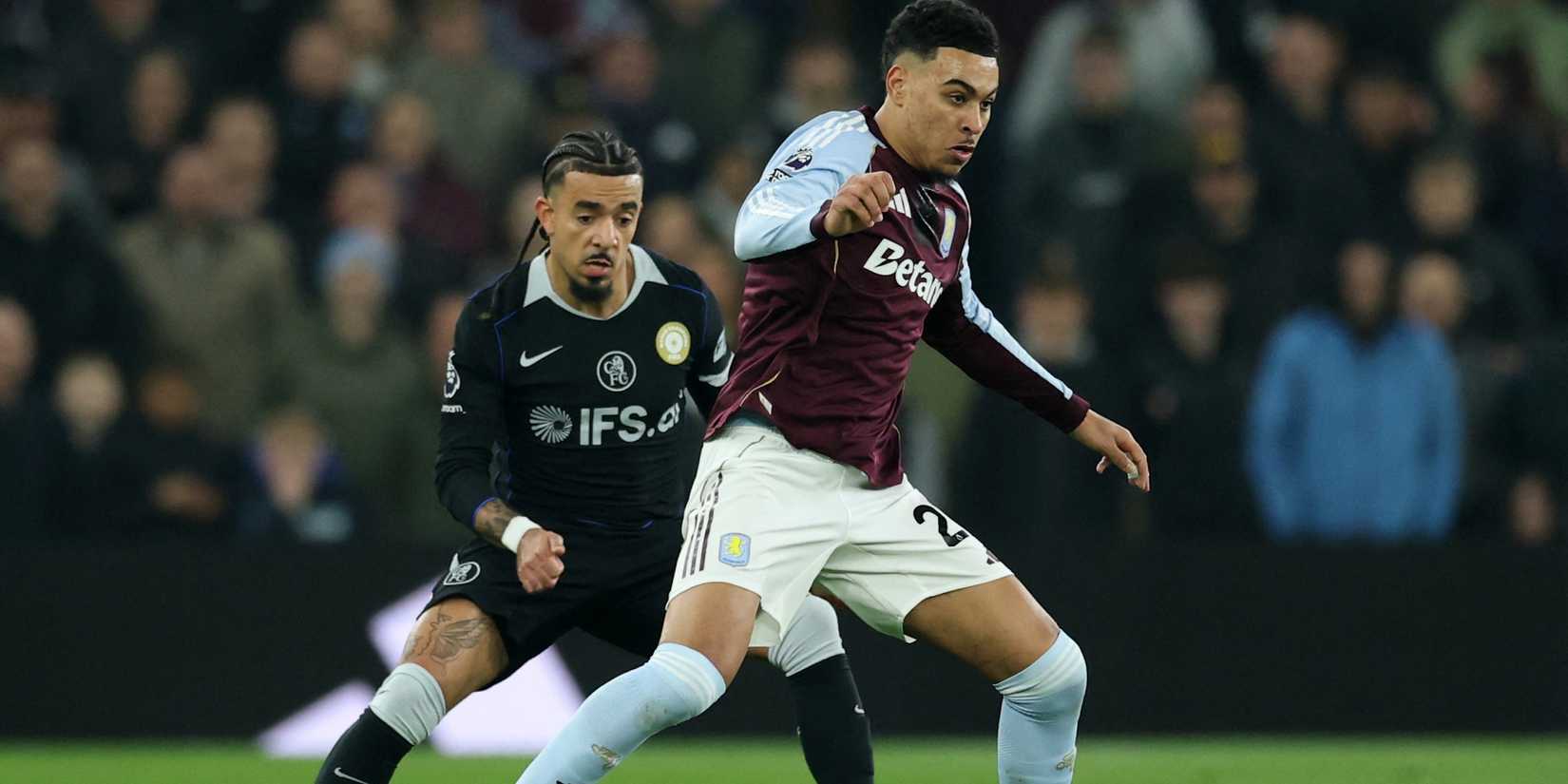 Aston Villa's Morgan Rogers in action with Chelsea's Malo Gusto 