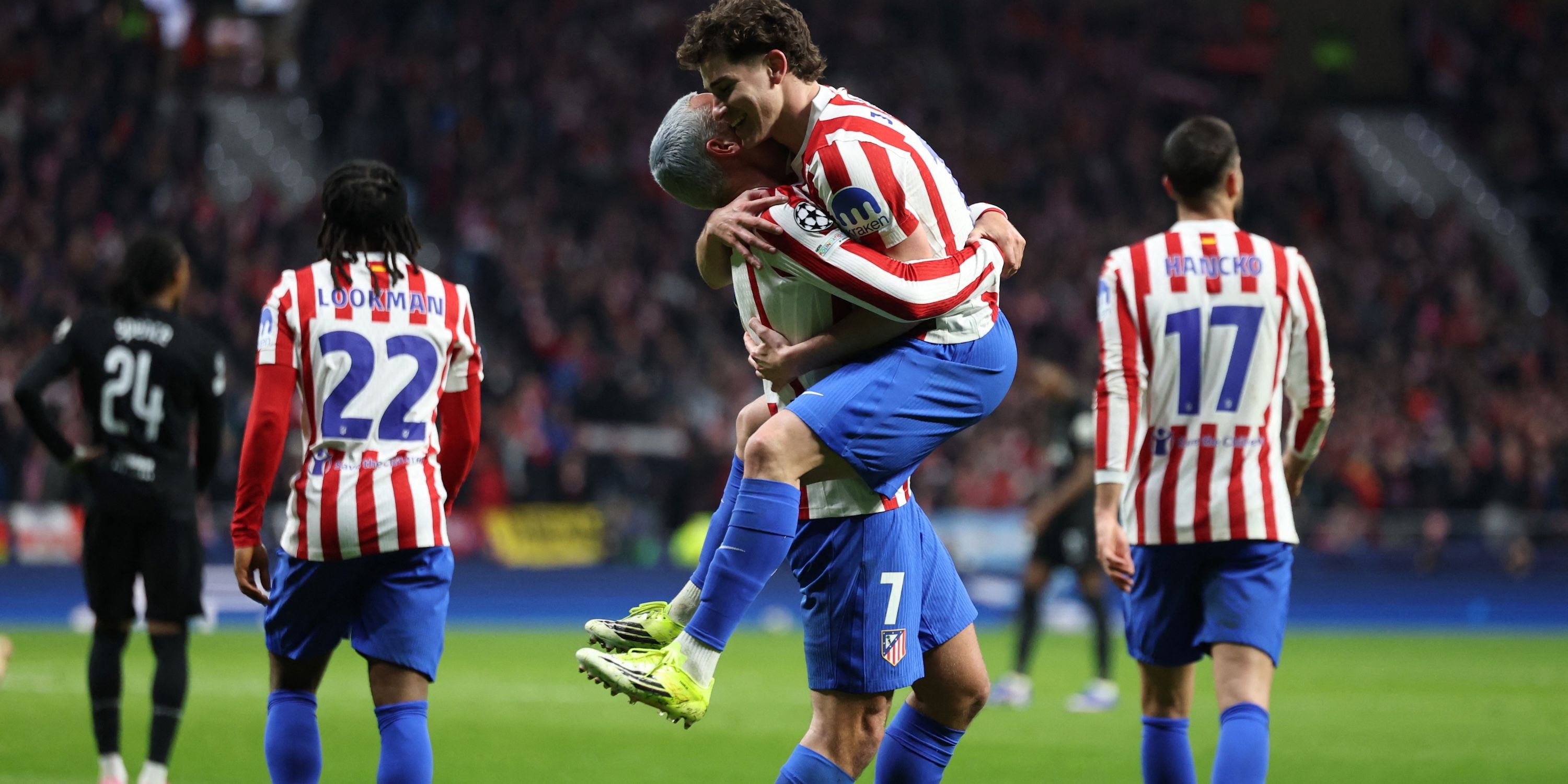 Atletico Madrid's Julian Alvarez celebrates scoring their fifth goal with Antoine Griezmann