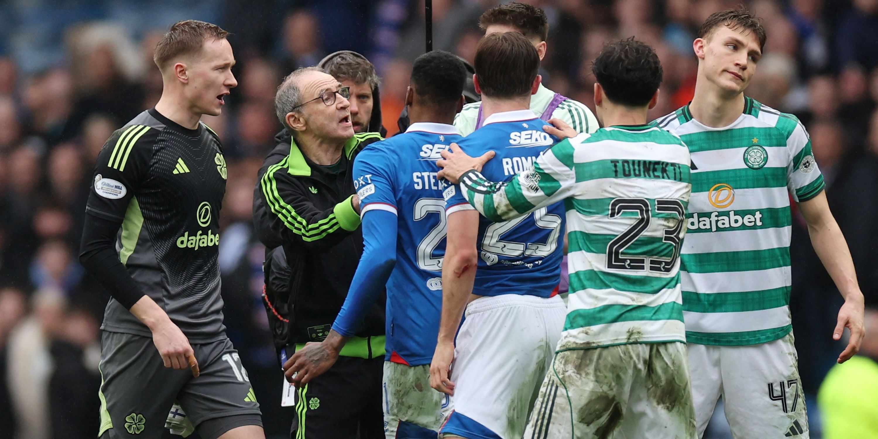 Celtic manager Martin O'Neill intervenes as Rangers' Dujon Sterling clashes with Celtic players at the end of the match