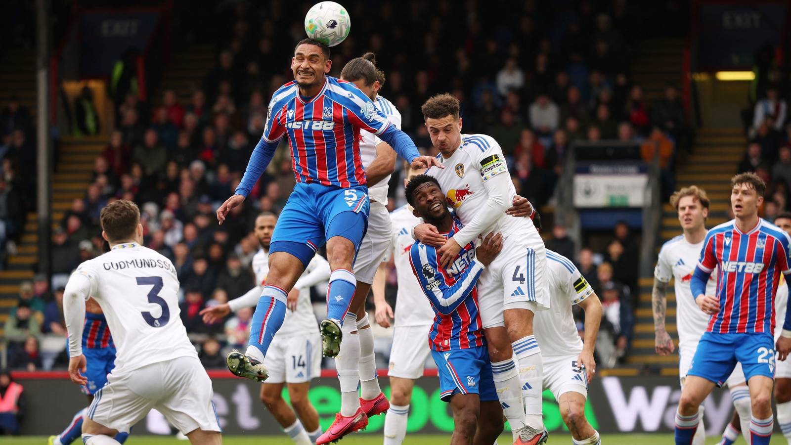 Crystal Palace's Maxence Lacroix and Jefferson Lerma in action with Leeds United's Ethan Ampadu and Dominic Calvert-Lewin