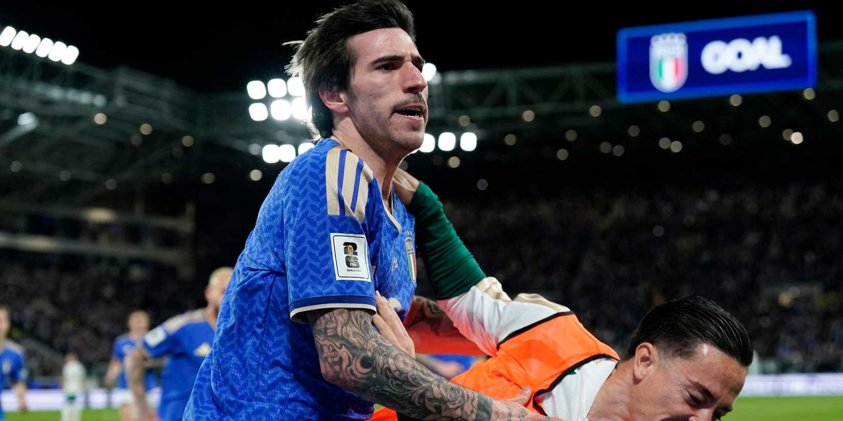  Italy's Sandro Tonali celebrates scoring their first goal with Giacomo Raspadori