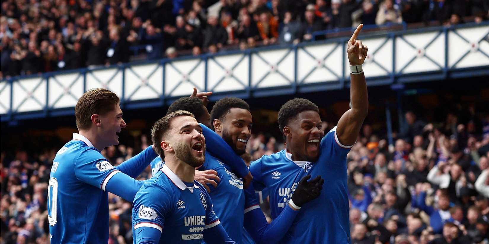 rangers celebrate scoring against celtic