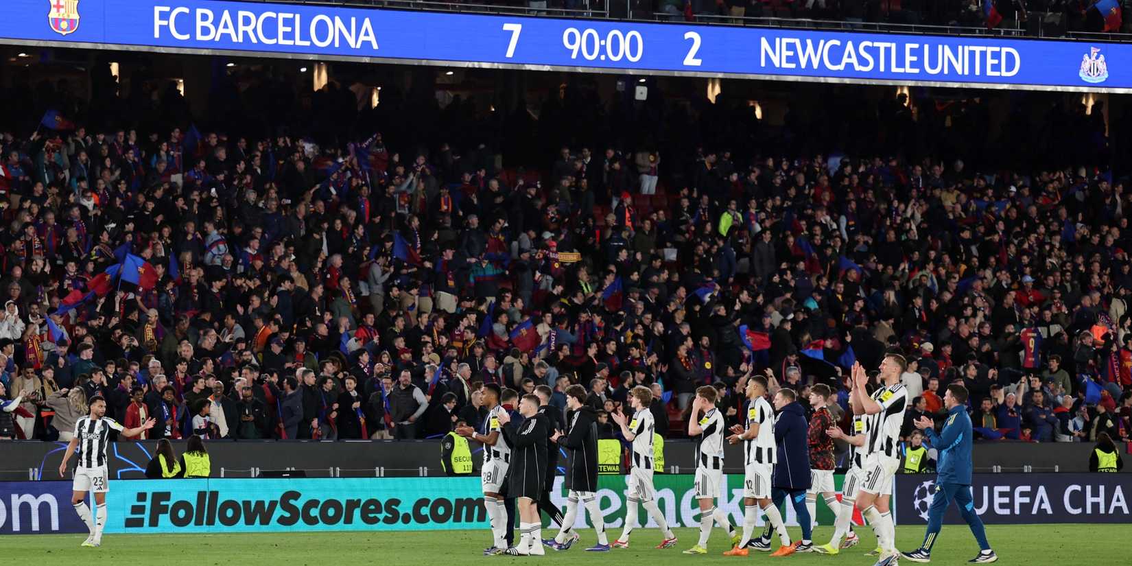 newcastle applaud their fans at the nou camp