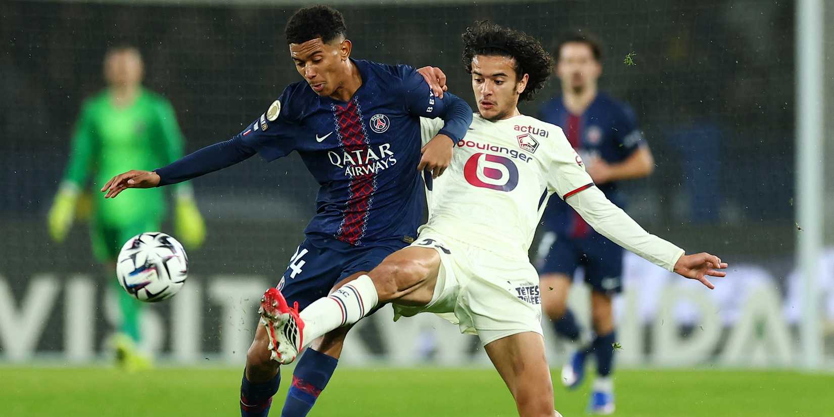 Paris St Germain's Senny Mayulu in action with Lille's Ayyoub Bouaddi 