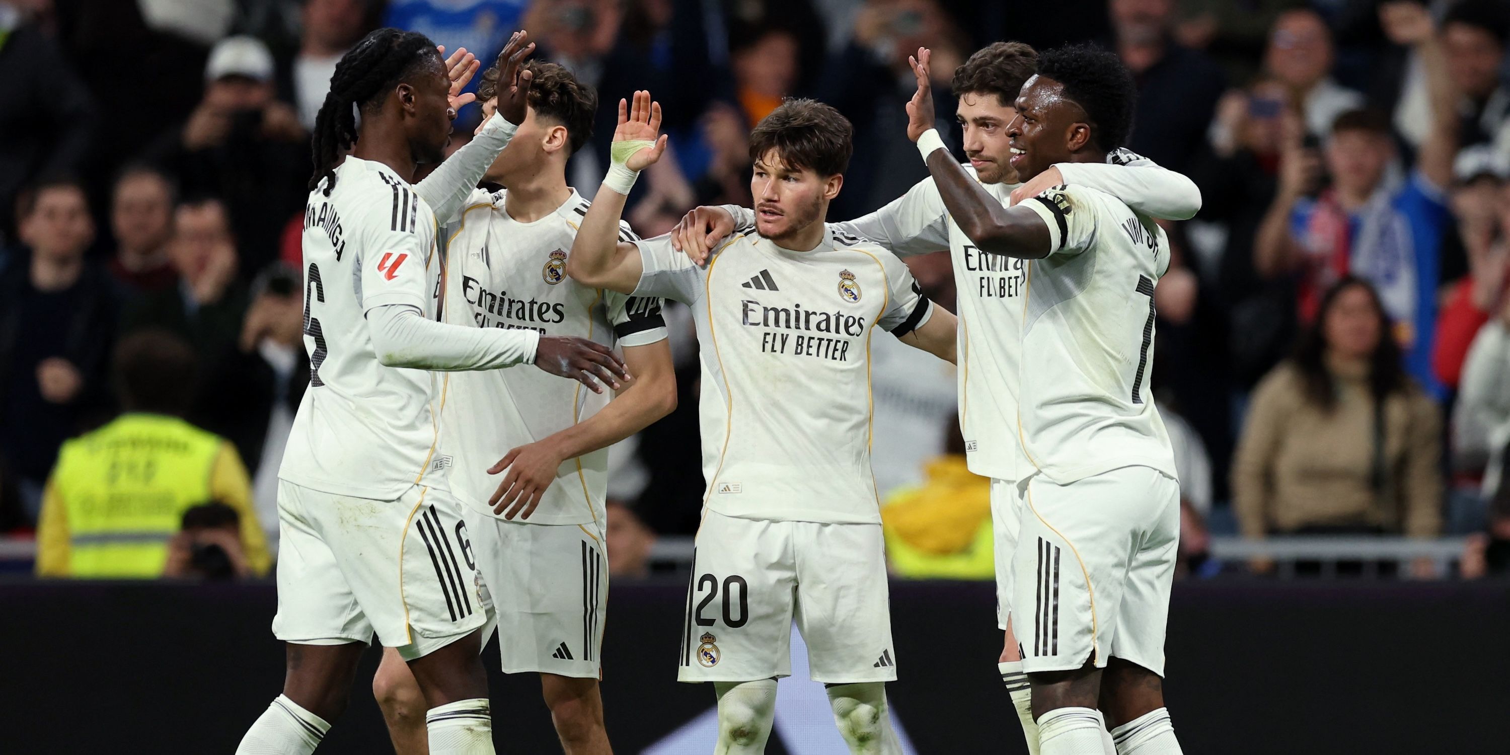 Real Madrid's Federico Valverde celebrates scoring their second goal with Thiago Pitarch, Fran Garcia, Vinicius Junior and Eduardo Camavinga