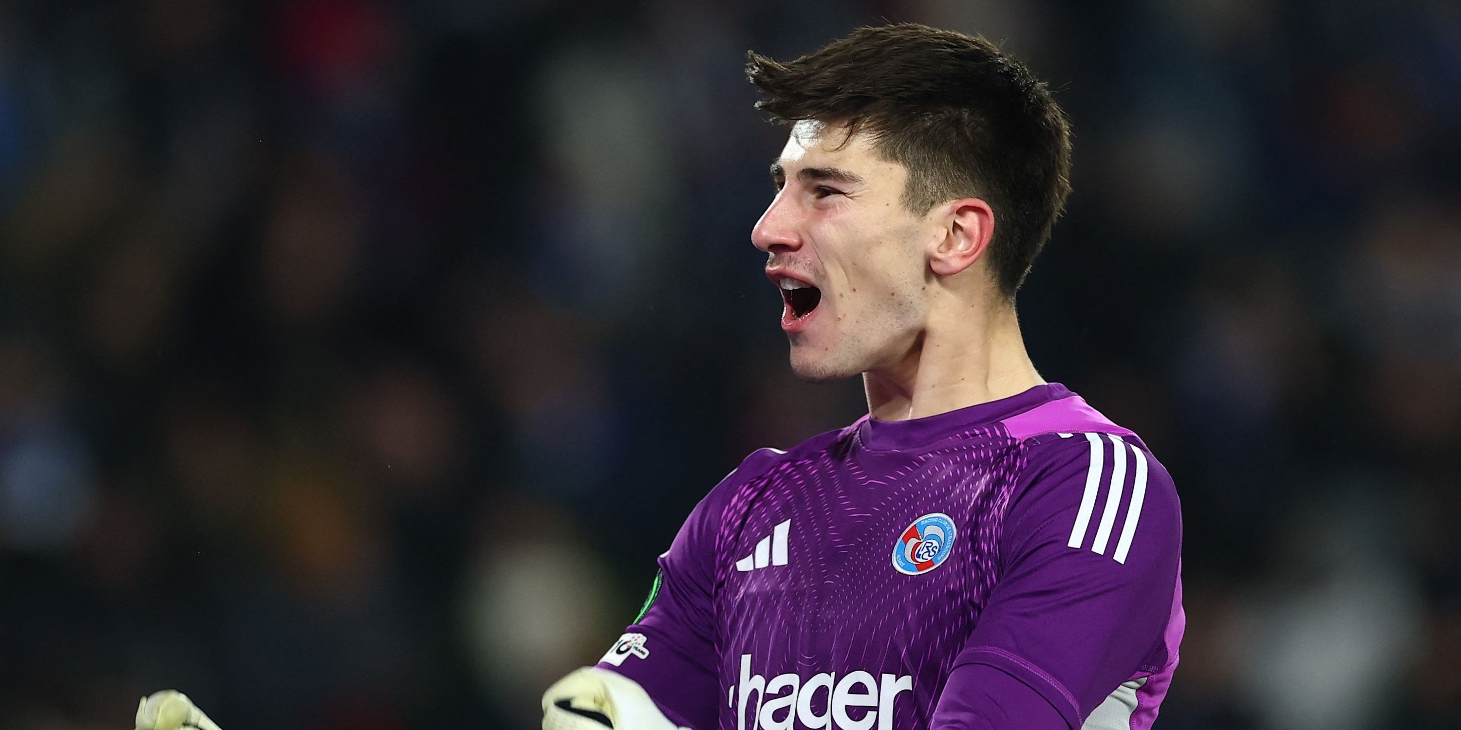 Strasbourg's Mike Penders celebrates after Samir El Mourabet scores their second goal 