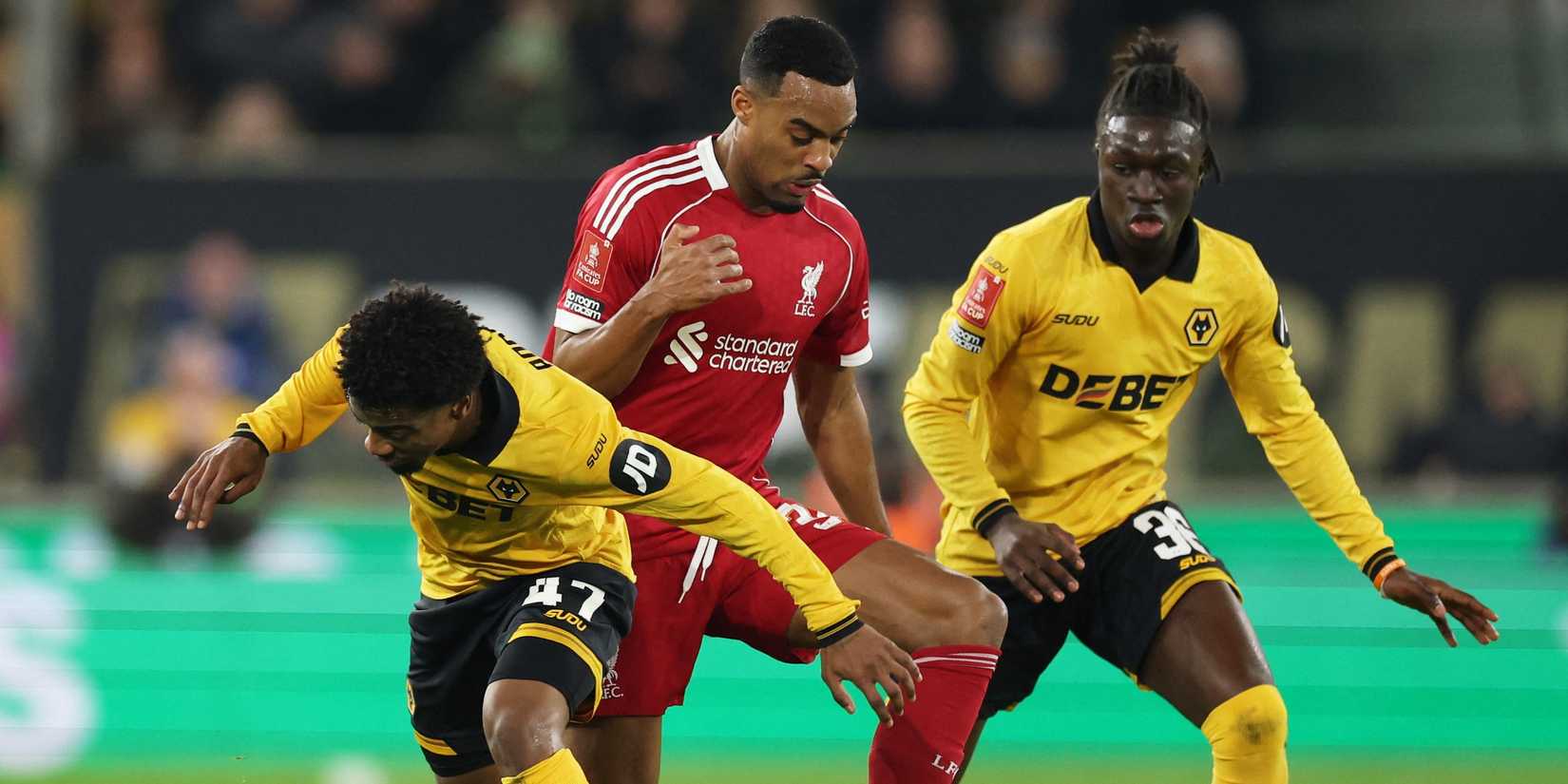 Angel Gomes of Wolverhampton Wanderers, Mateus Mane against Ryan Gravenberch of Liverpool