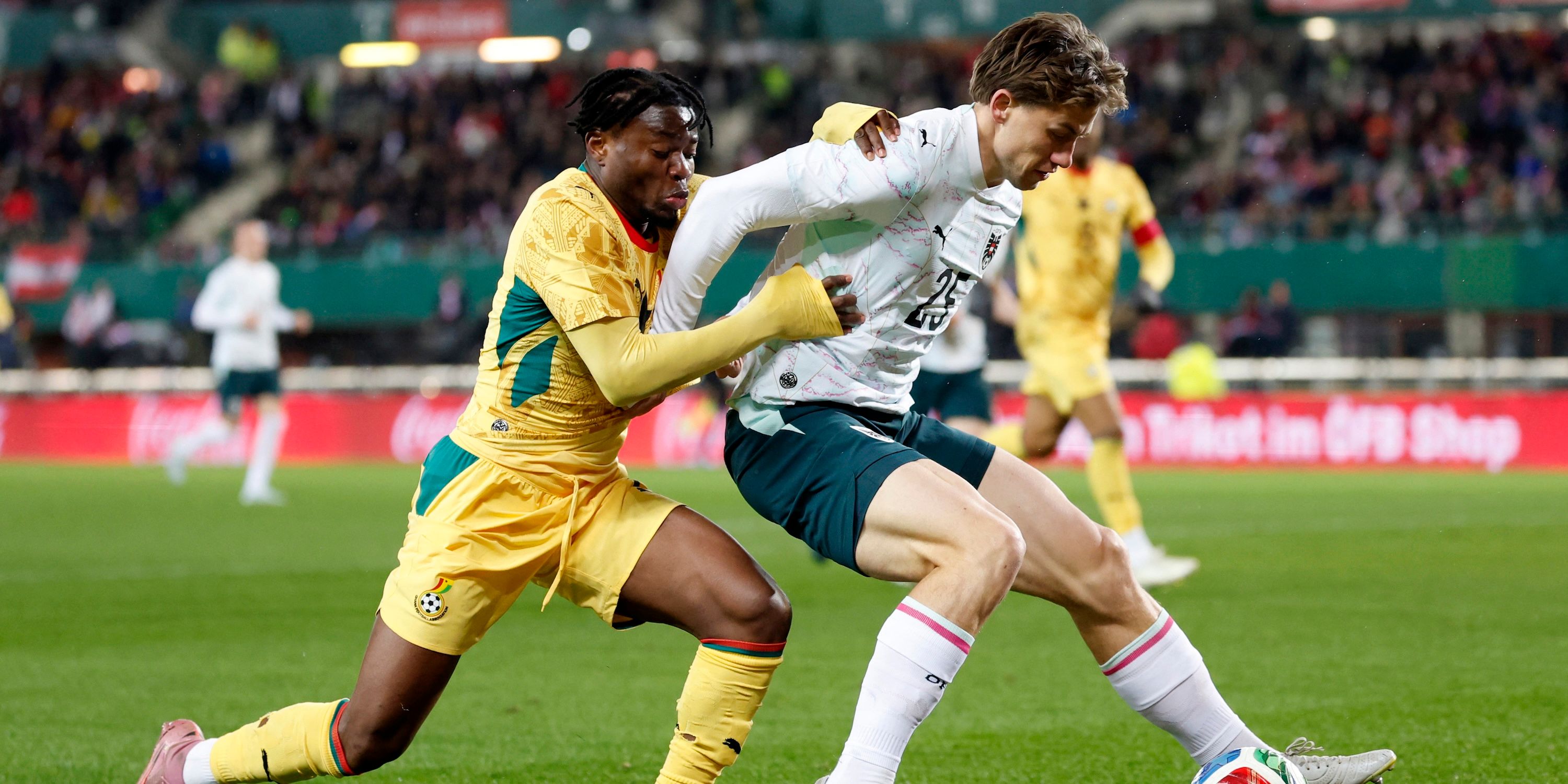 Michael Svoboda from Austria playing with Fatawu Issahaku from Ghana