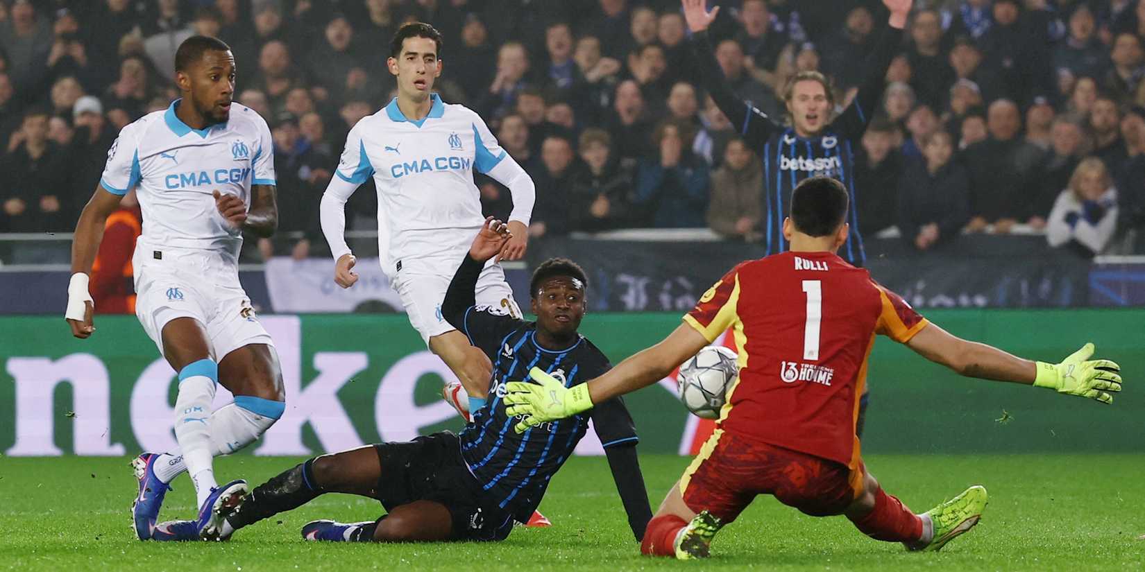 Club Brugge's Mamadou Diakhon in action with Olympique de Marseille's Geronimo Rulli 