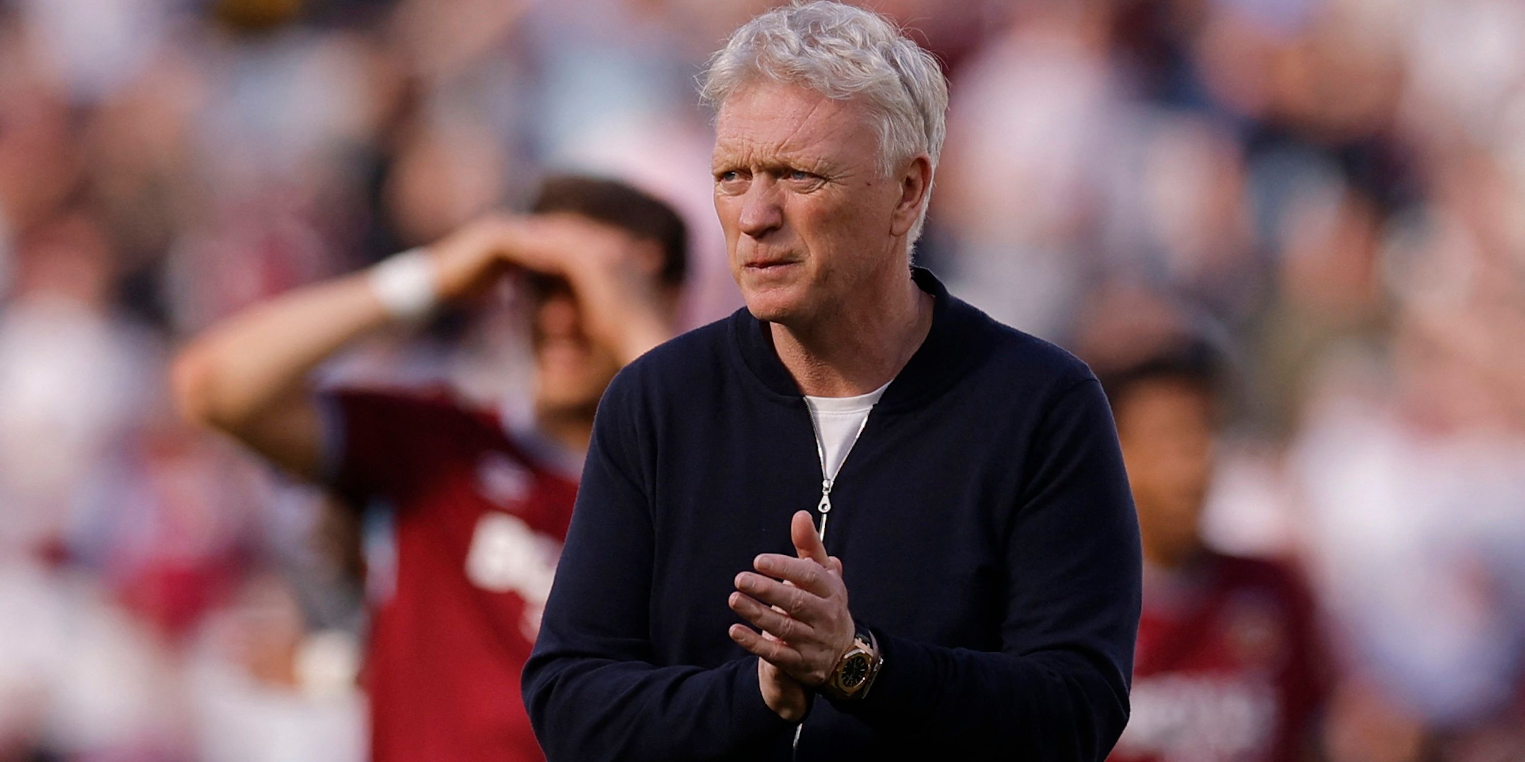 Everton manager David Moyes looks dejected as he applauds fans after the match 