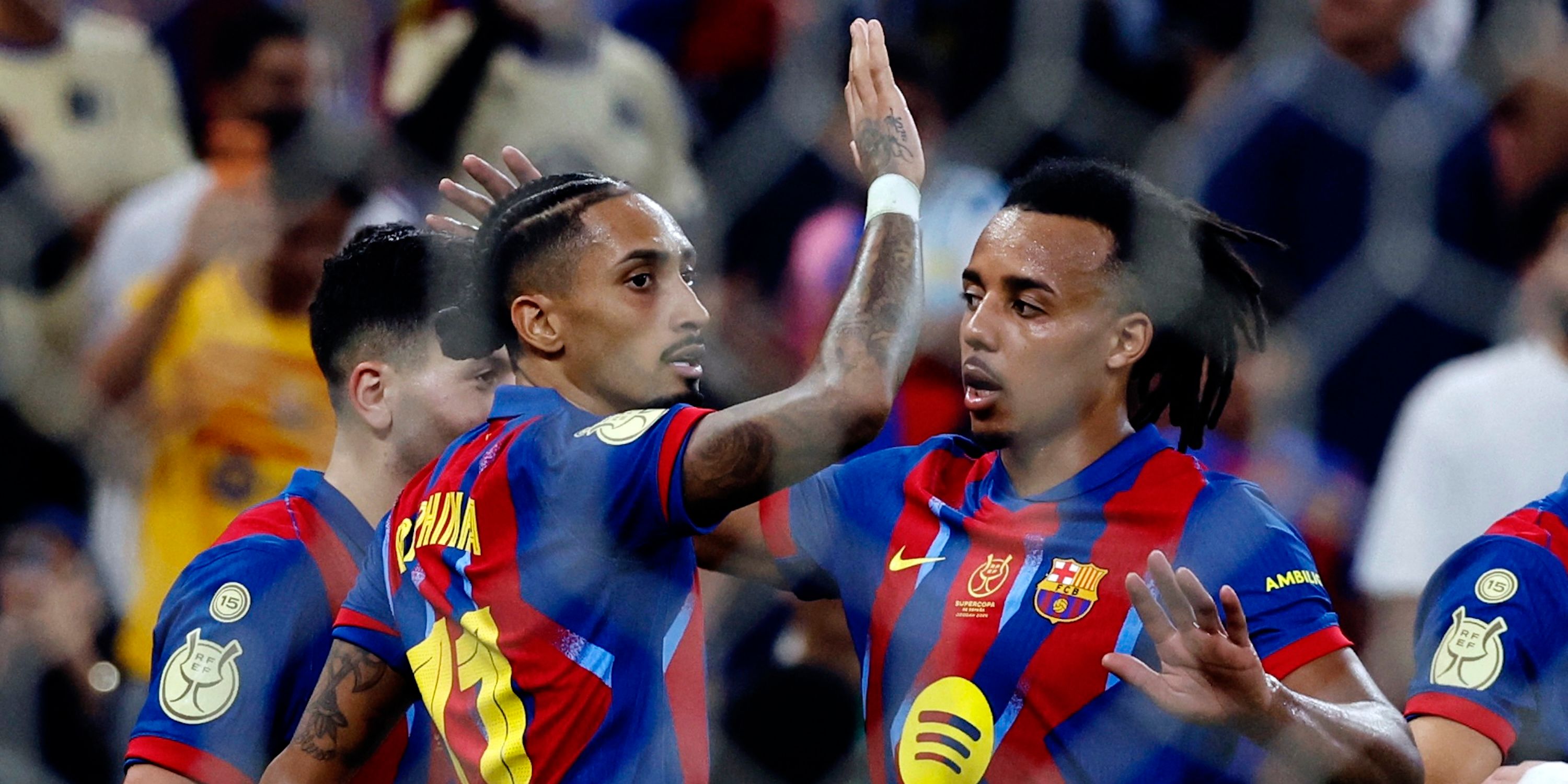  FC Barcelona's Raphinha celebrates scoring their fifth goal with Jules Kounde