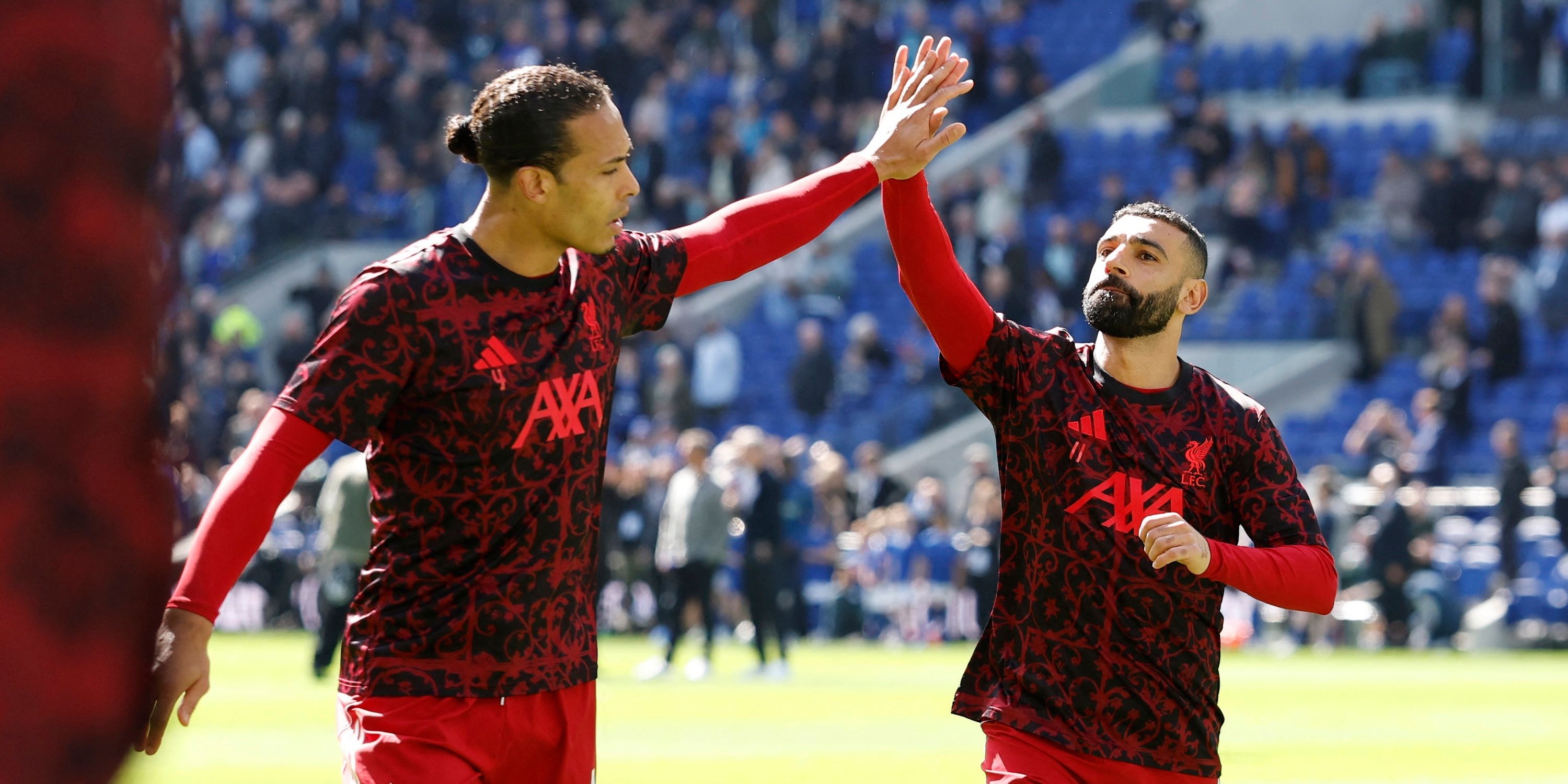 Liverpool's Virgil van Dijk and Mohamed Salah during the warm up