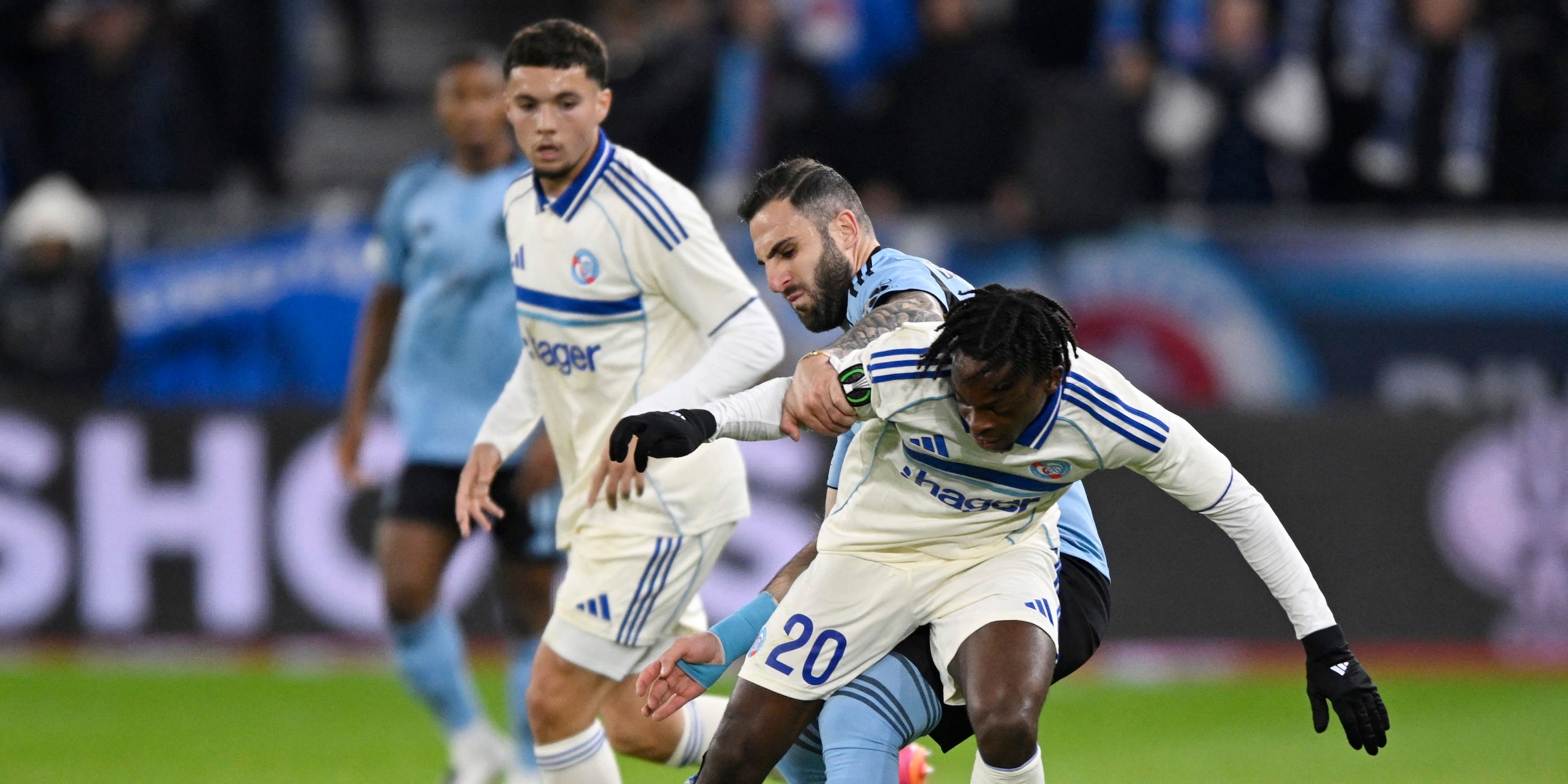 Strasbourg's Martial Godo in action with Slovan Bratislava's Tigran Barseghyan