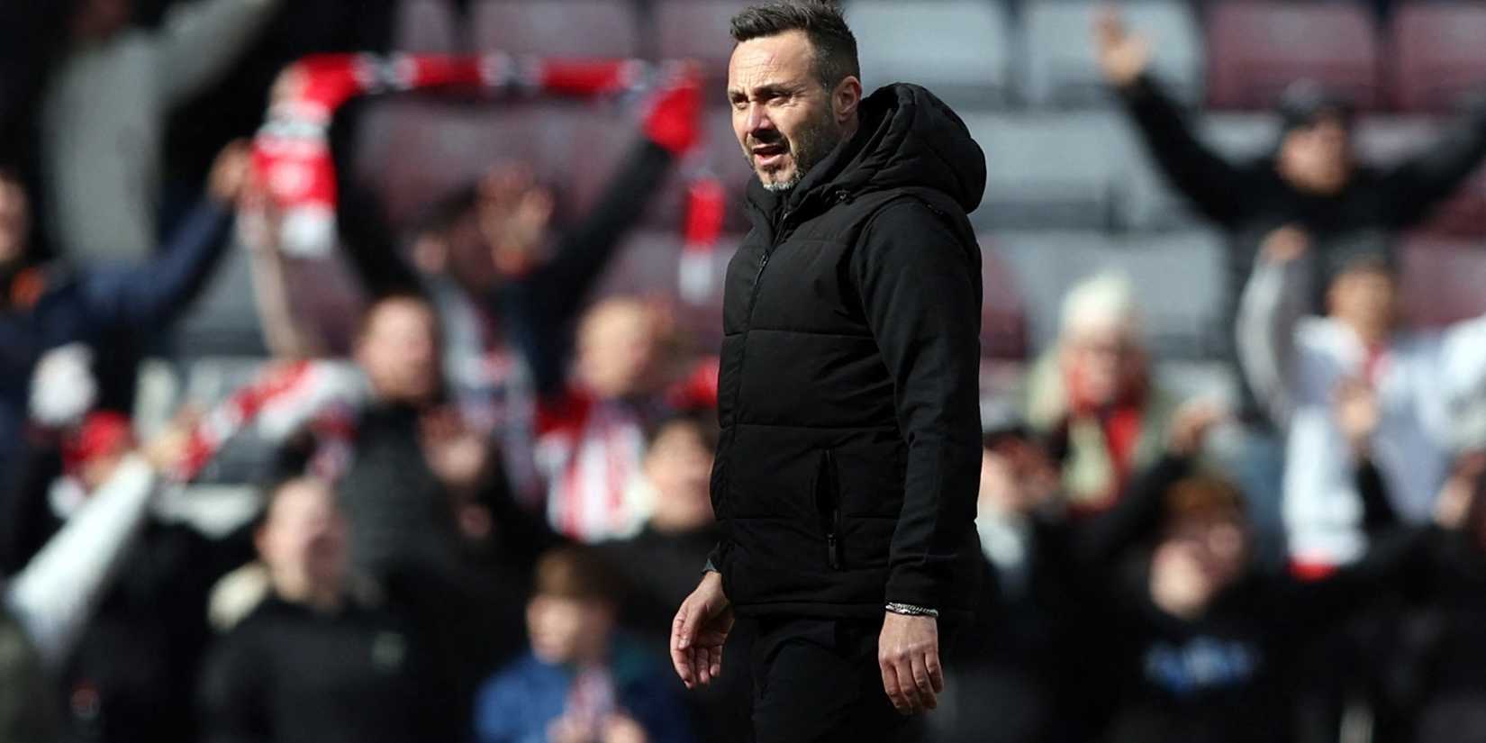 Tottenham Hotspur manager Roberto De Zerbi looks dejected after the match