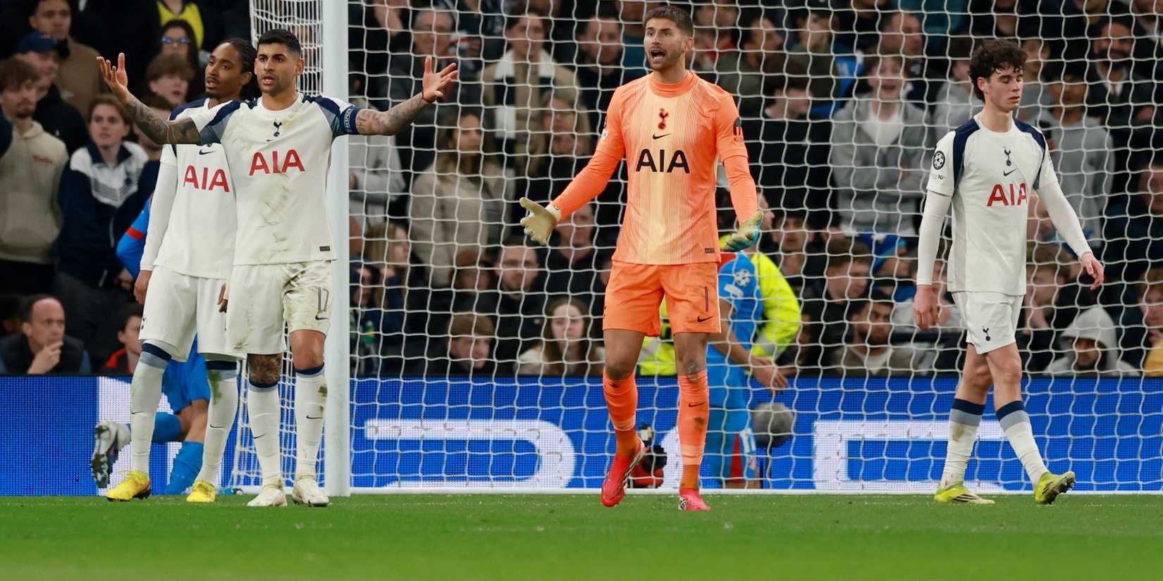 Tottenham Hotspur's Cristian Romero and Guglielmo Vicario look dejected after Atletico Madrid's David Hancko scores their second goal
