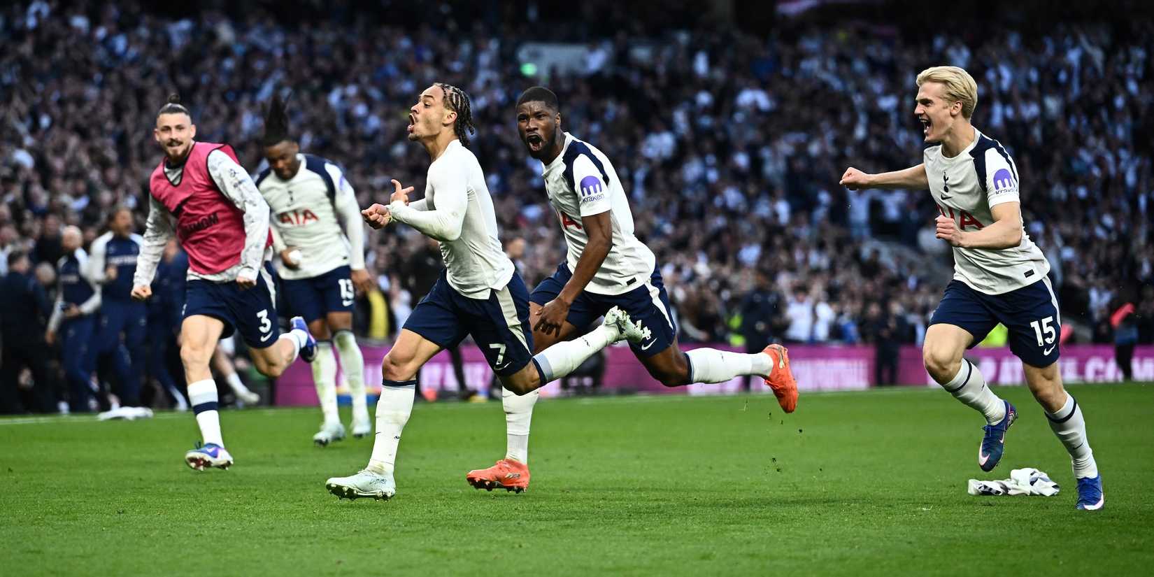 Tottenham Hotspur's Xavi Simons celebrates scoring his second goal with Lucas Bergvall and Kevin Danso