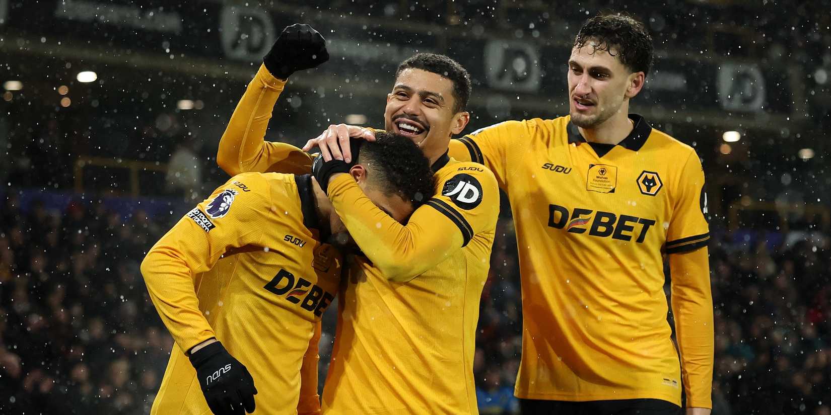 Wolverhampton Wanderers' Joao Gomes celebrates scoring his first goal with Andre and Santiago Bueno