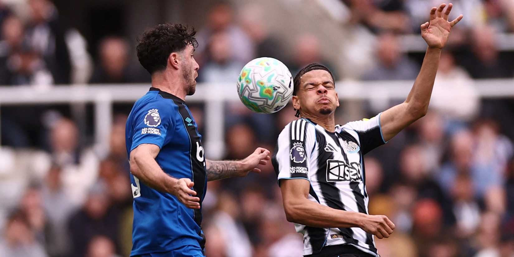 AFC Bournemouth's Marcos Senesi in action with Newcastle United's William Osula