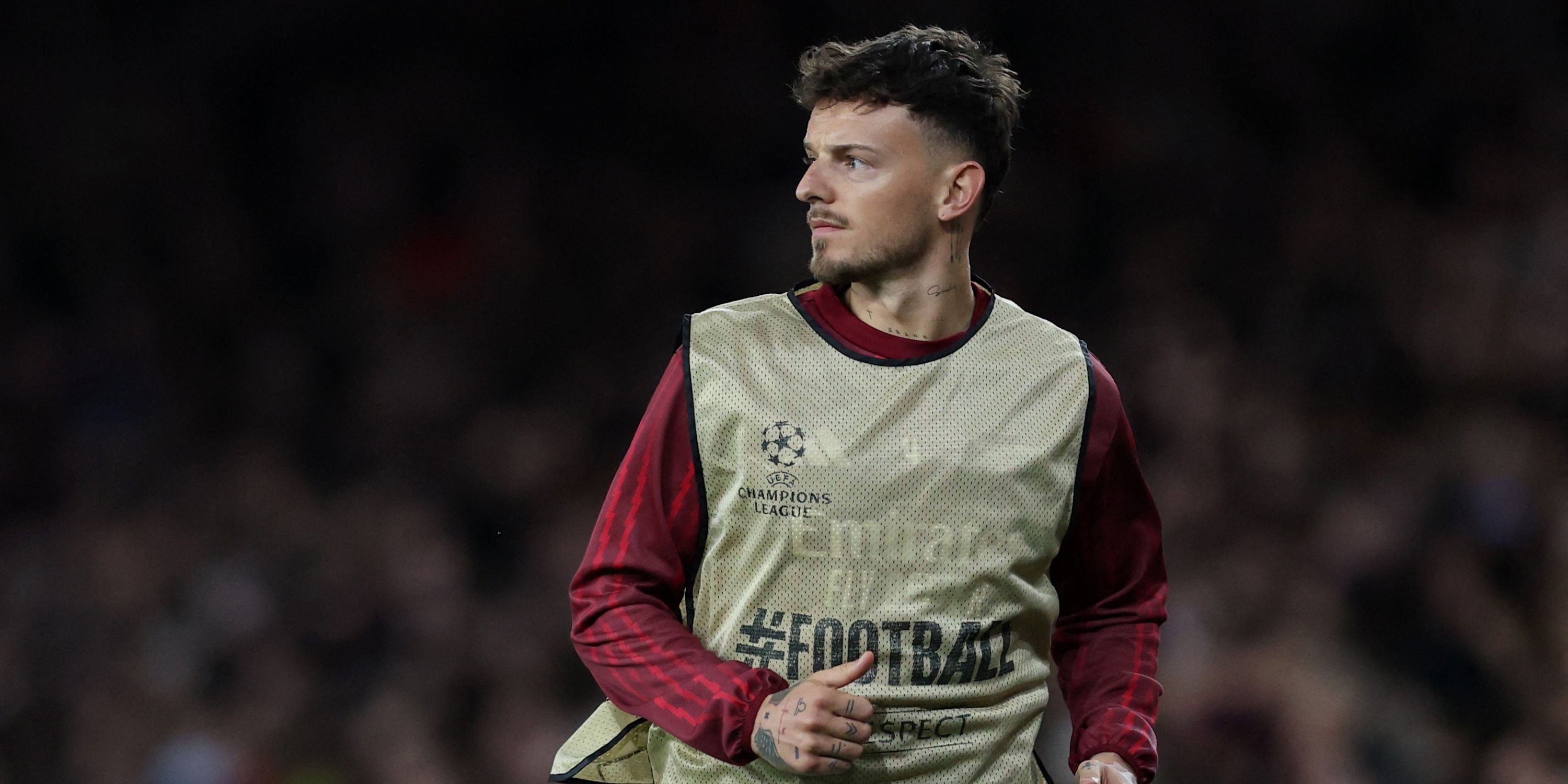 Arsenal's Ben White warms up as a substitute during the match